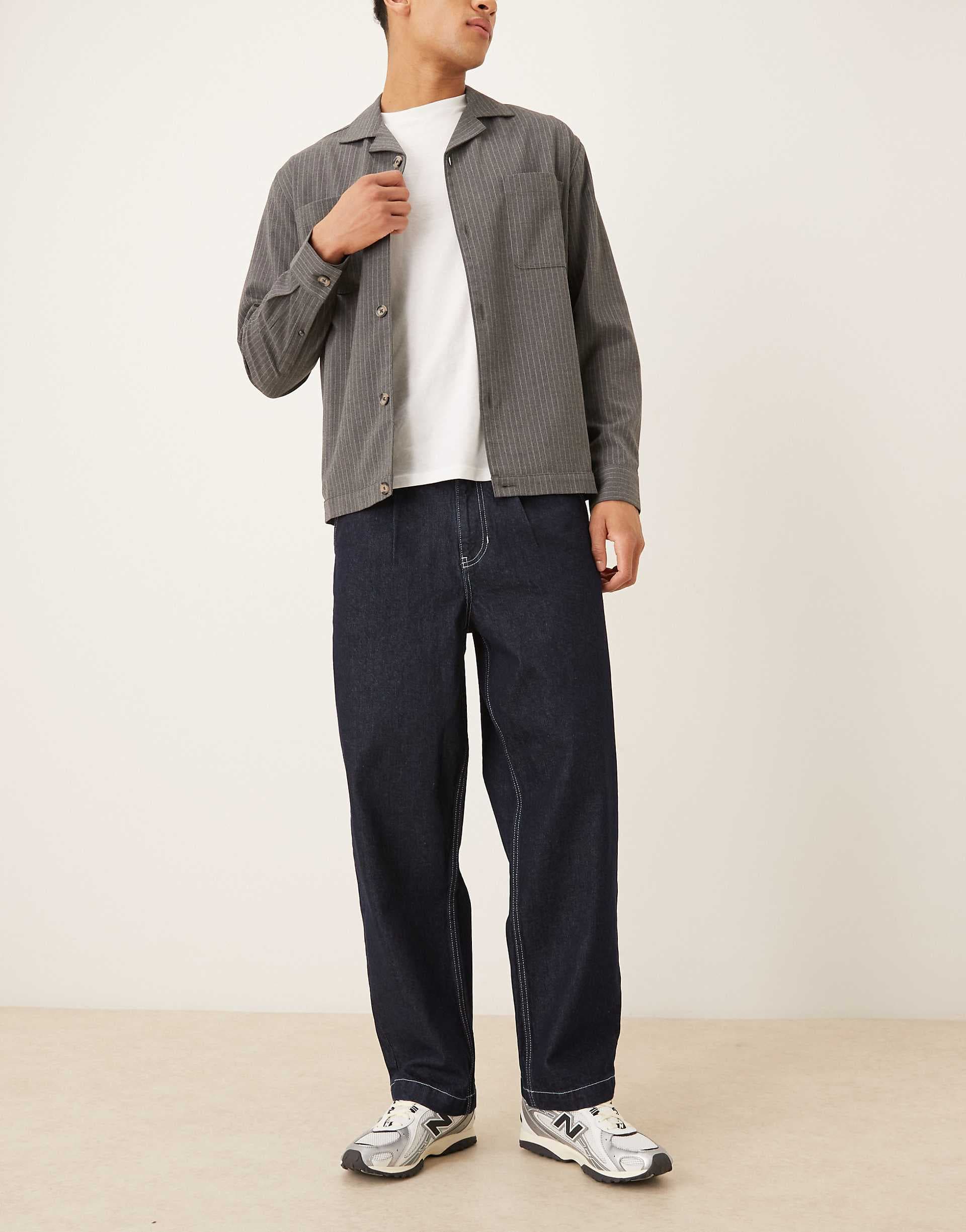 ASOS DESIGN relaxed tapered fit jeans with pleat detail in black