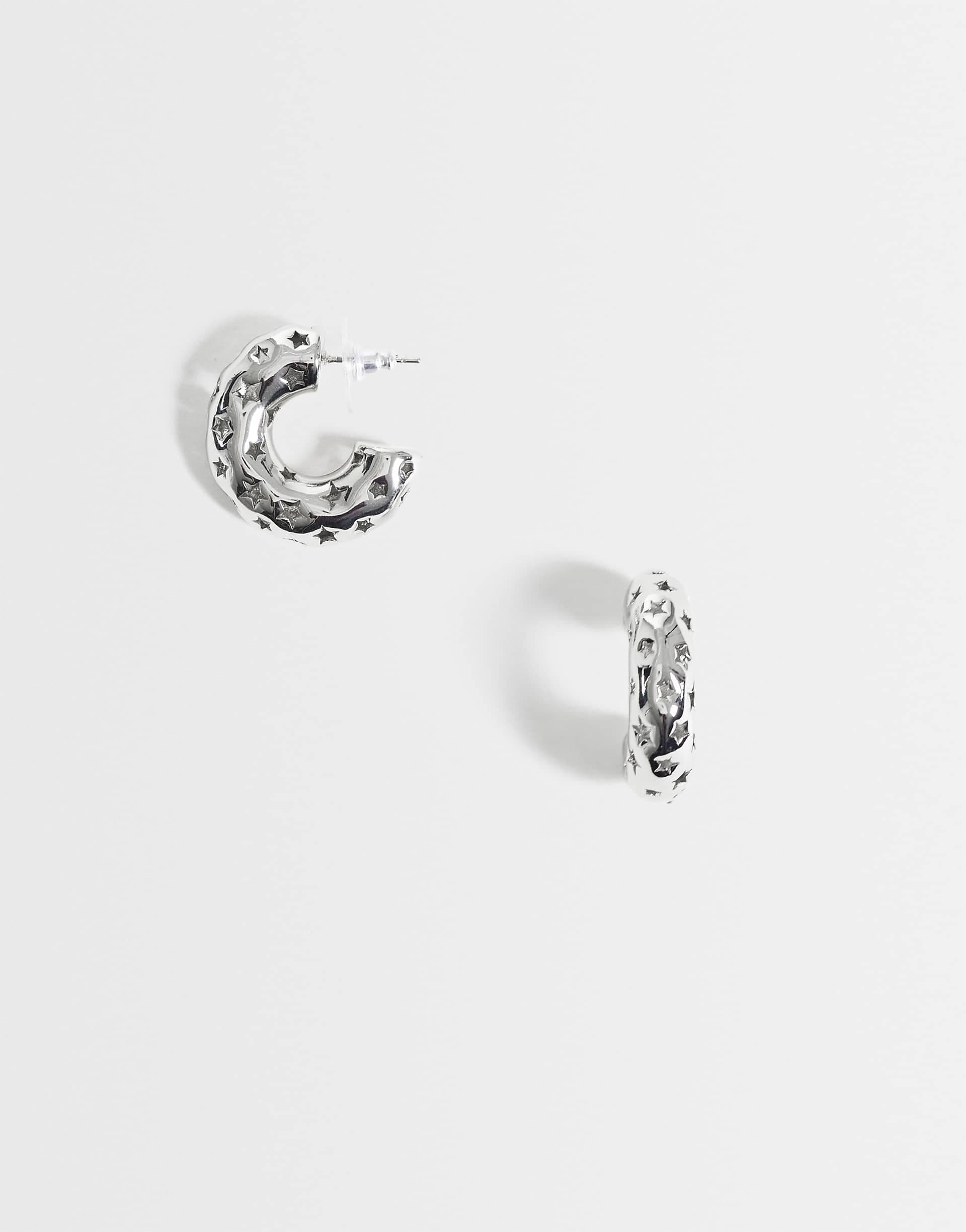 Reclaimed Vintage cut out work star hoop earrings in silver tone