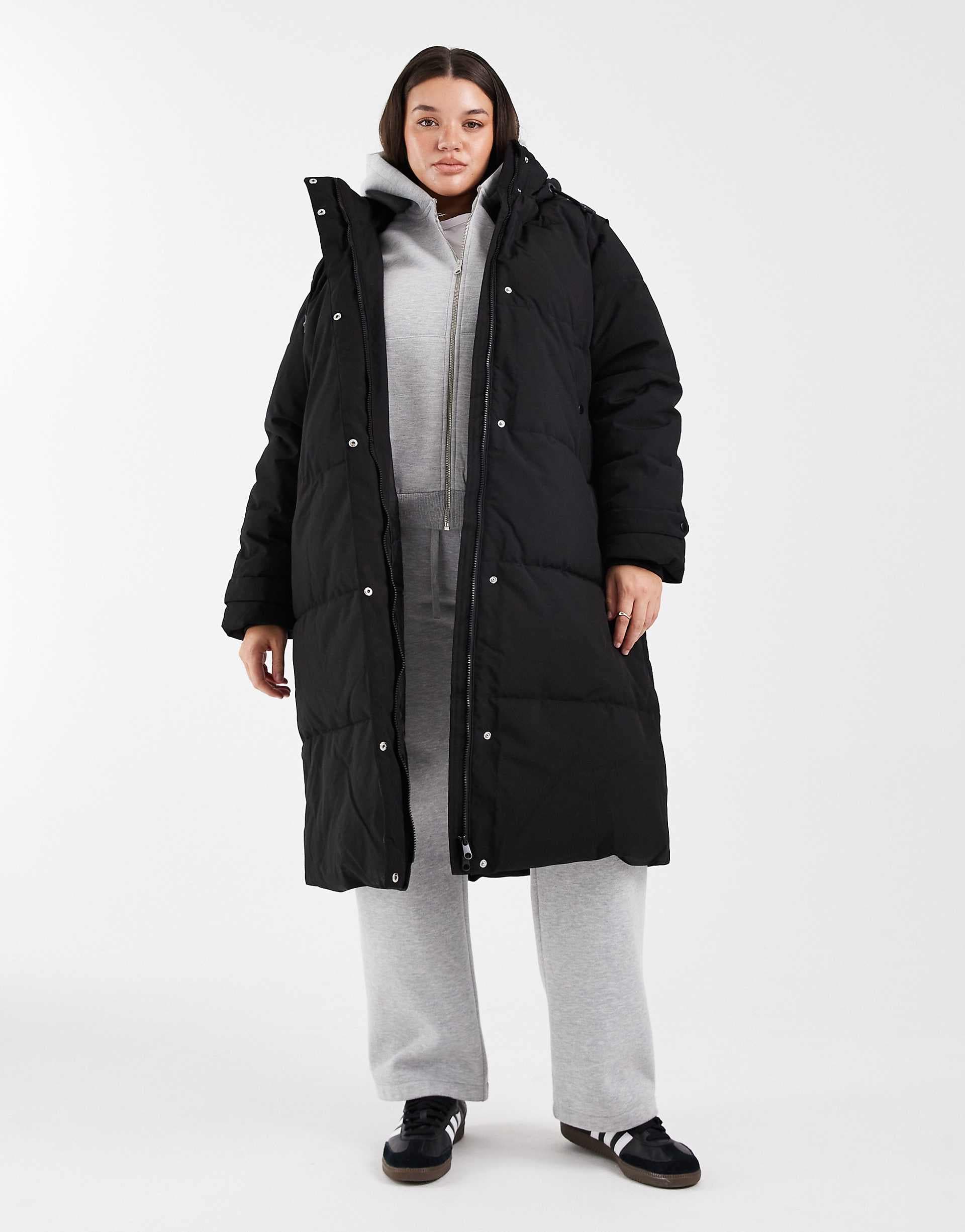 Vero Moda Curve 2 in 1 longline puffer coat with removable sleeves in black
