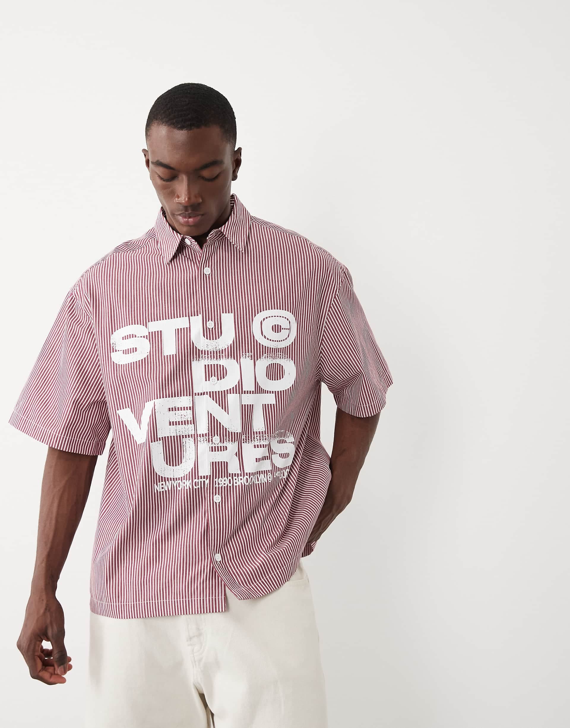 ASOS DESIGN oversized plaid shirt with chest print in red