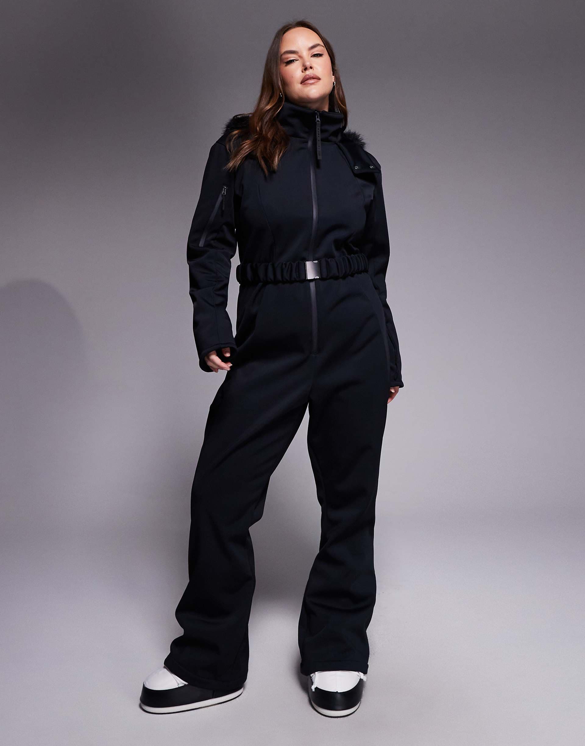ASOS 4505 Curve Ski soft shell belted ski suit with slim kick leg and faux fur hood in black