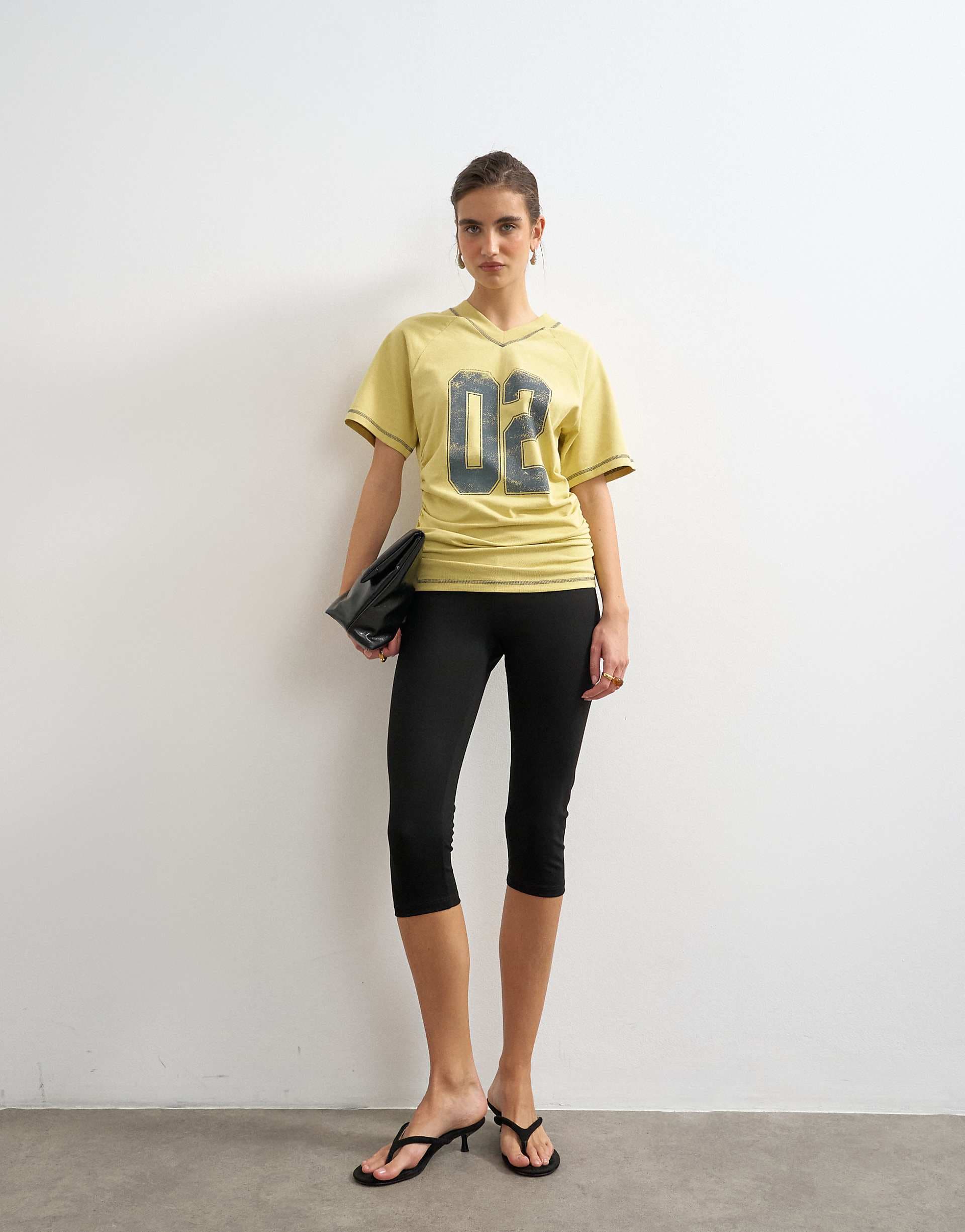 Topshop micro v-neck ruched sides graphic tee in yellow