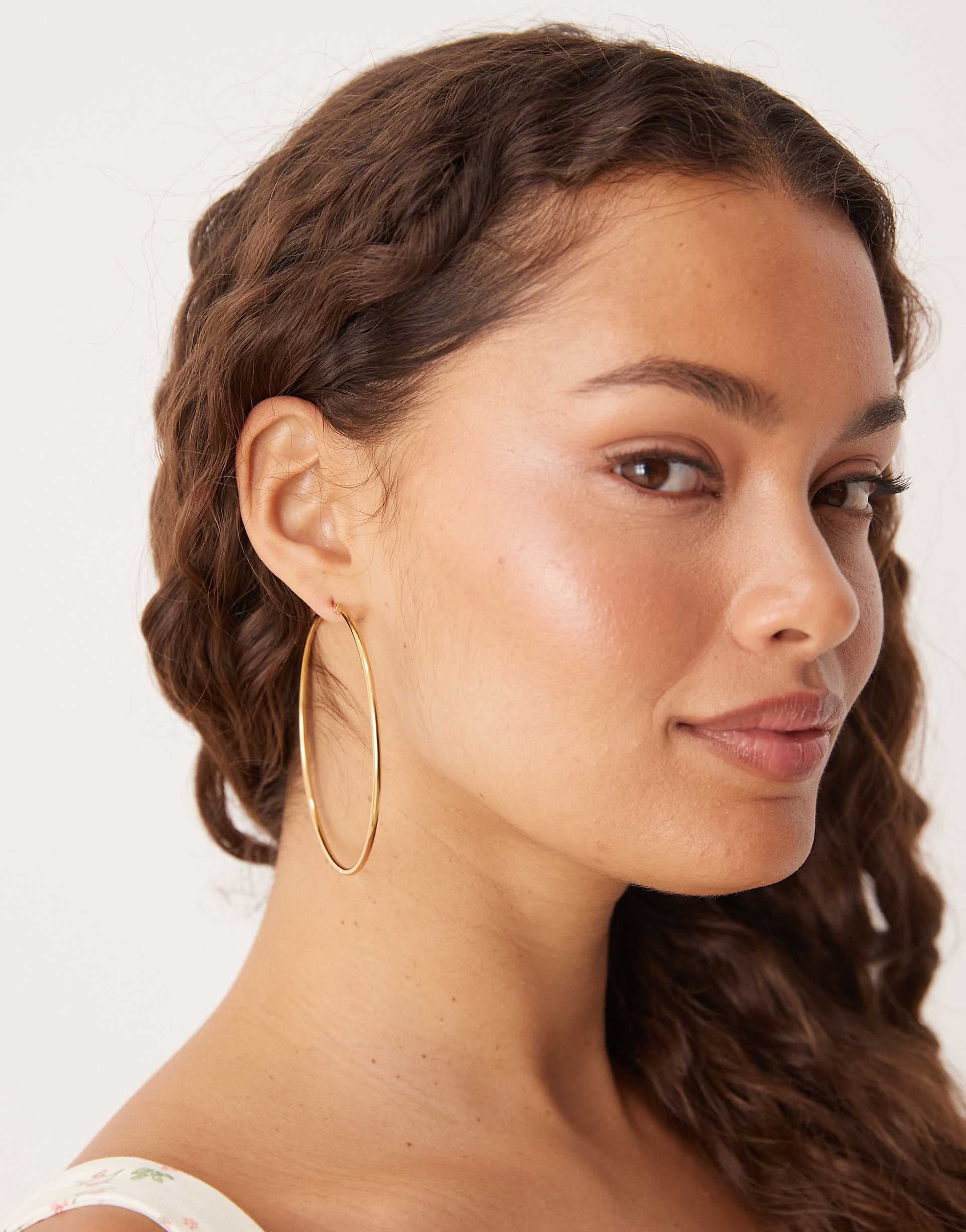Lost Souls 70mm hoop earrings in 18kt gold plated stainless steel