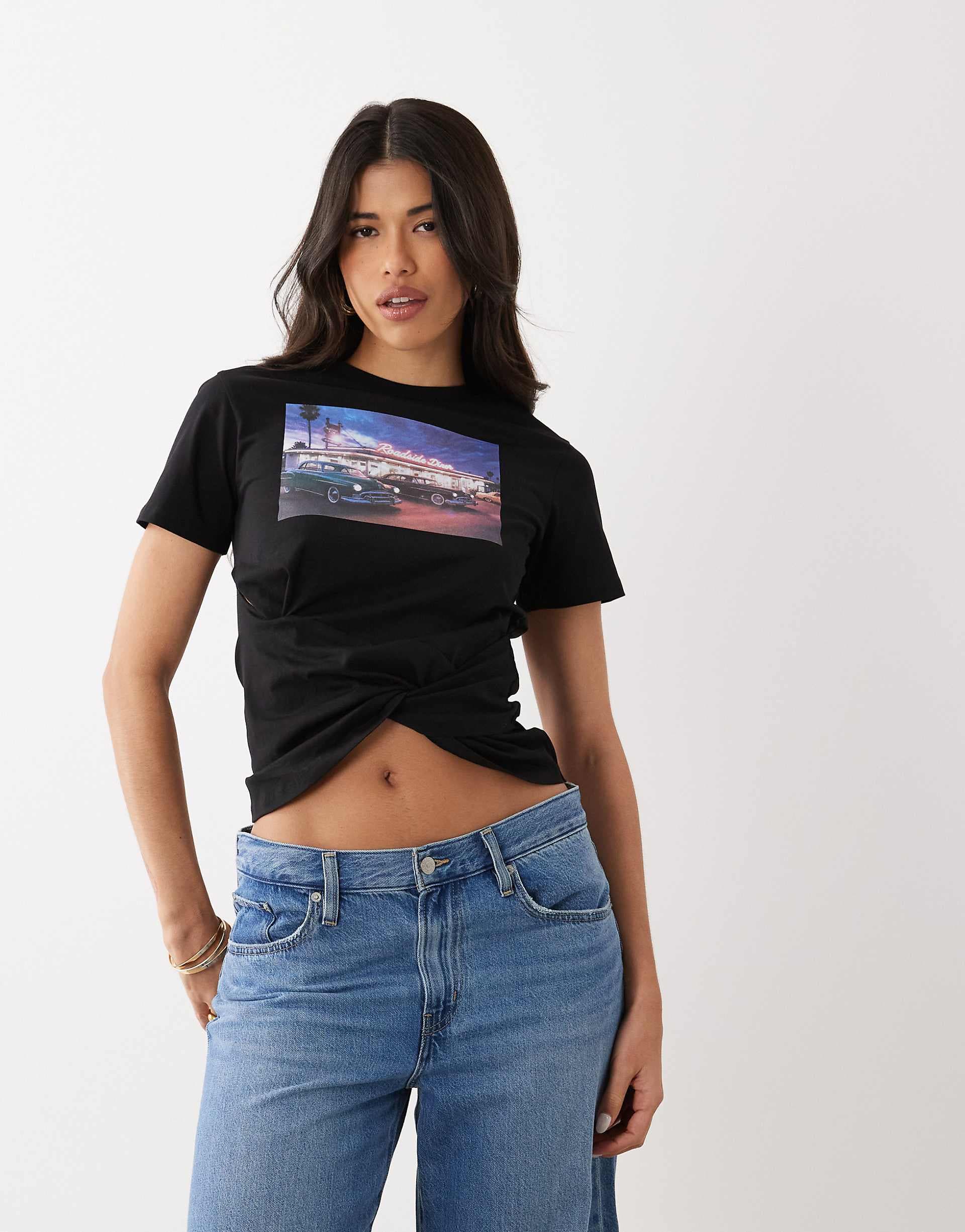 ASOS DESIGN short sleeve asymmetric hem t-shirt with distressed motel graphic in black