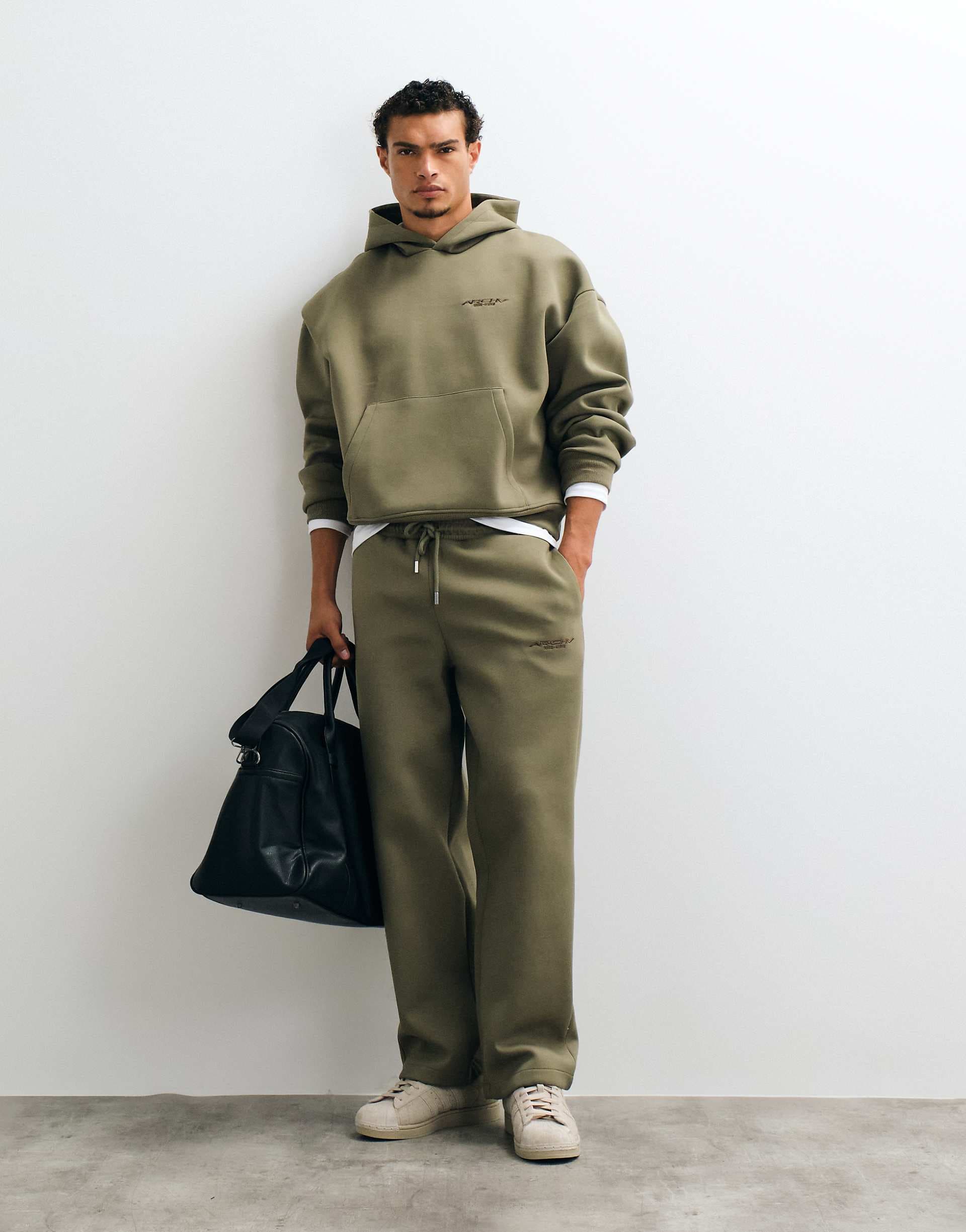 ASOS DESIGN wide leg sweatpants with embroidery in olive green scuba-style fabric