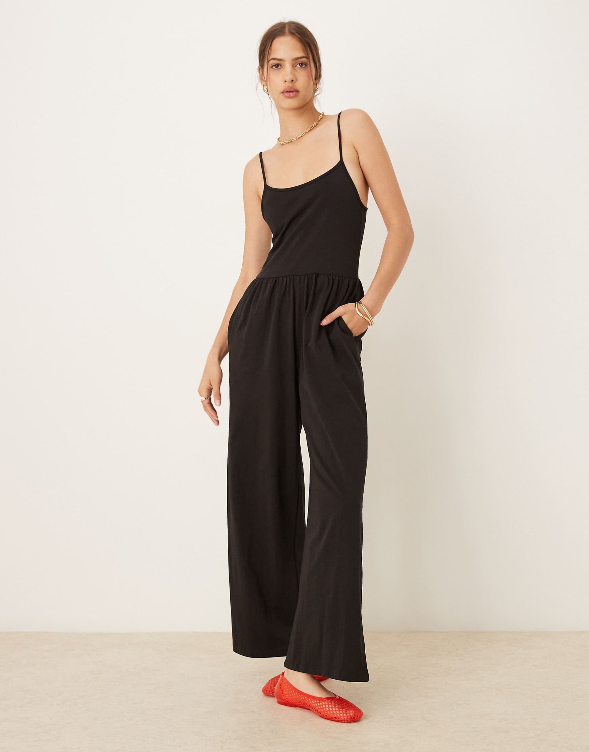 ASOS DESIGN cami wide leg jumpsuit with pockets in black