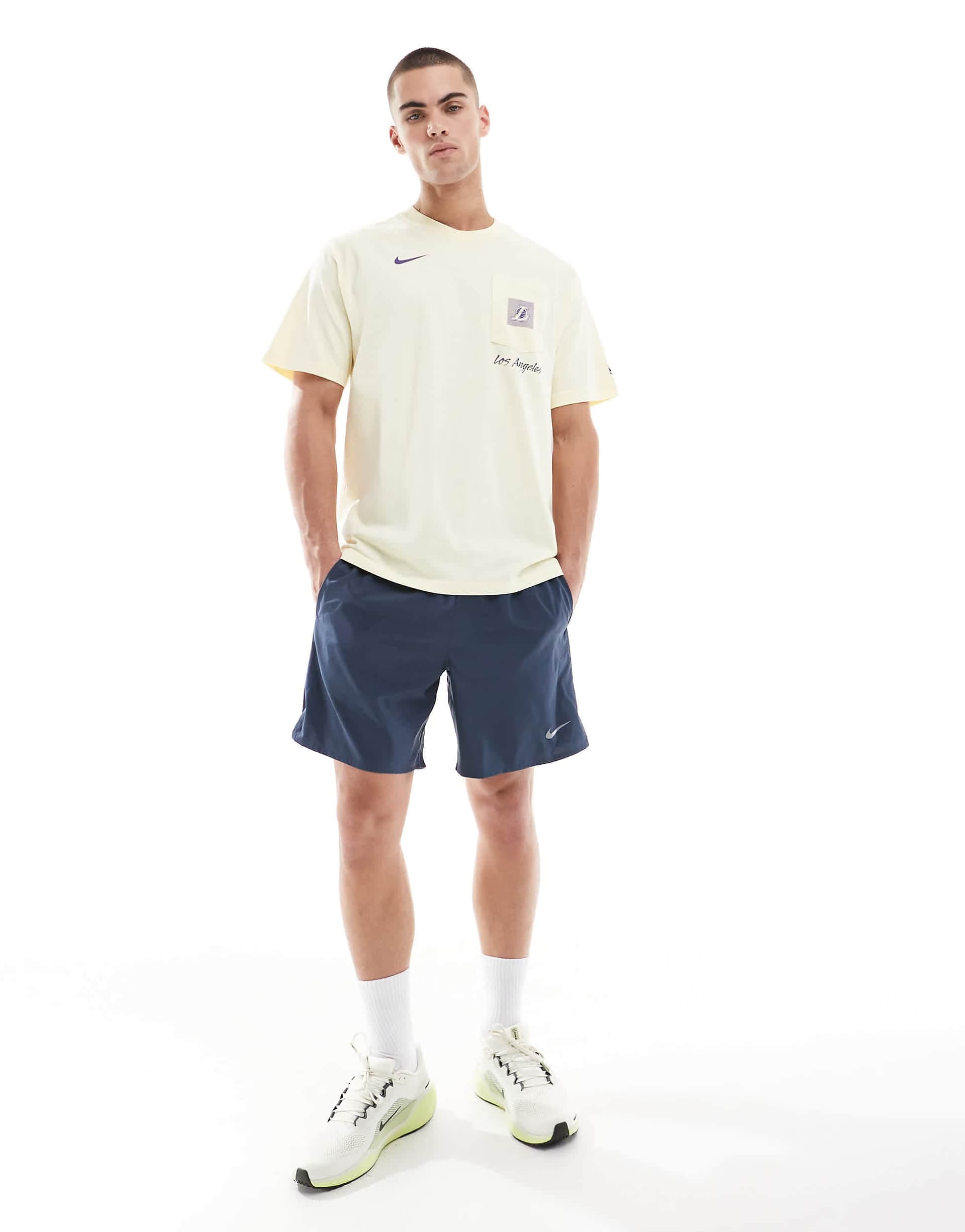 Nike Running Challenger Dri-FIT 7 inch shorts in dark blue