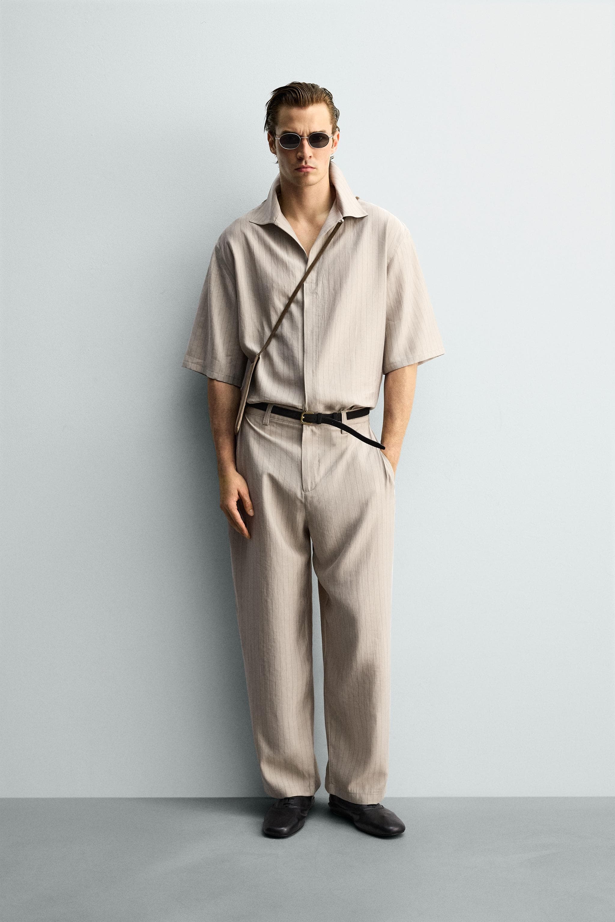 FLOWING TROUSERS WITH SIDE PLEATS