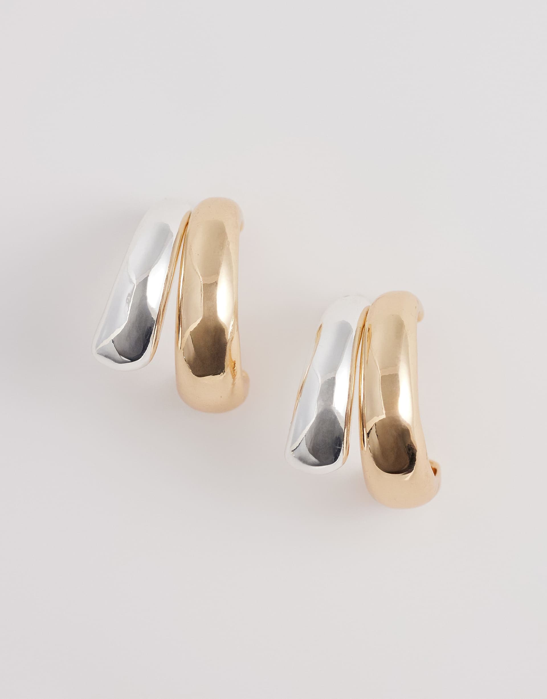 DesignB London mixed metal hoop earrings in gold and silver