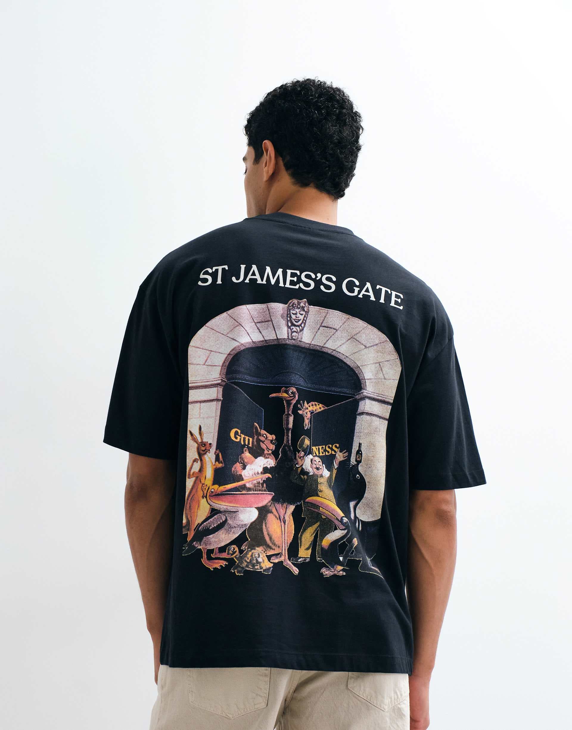 ASOS DESIGN oversized tee with Guinness print in Black