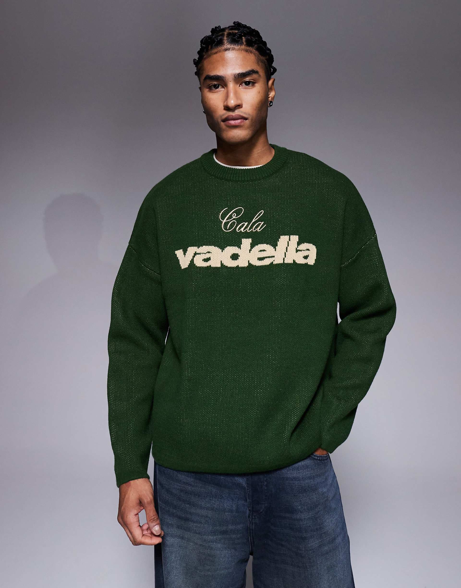ASOS DESIGN oversized knit crew neck sweater with Vadella graphic in green