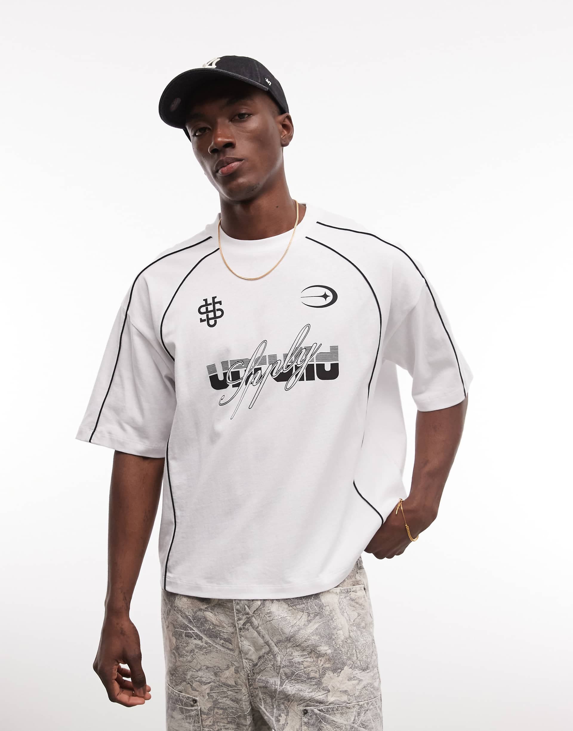 ASOS DESIGN boxy oversized T-shirt with soccer graphic in white