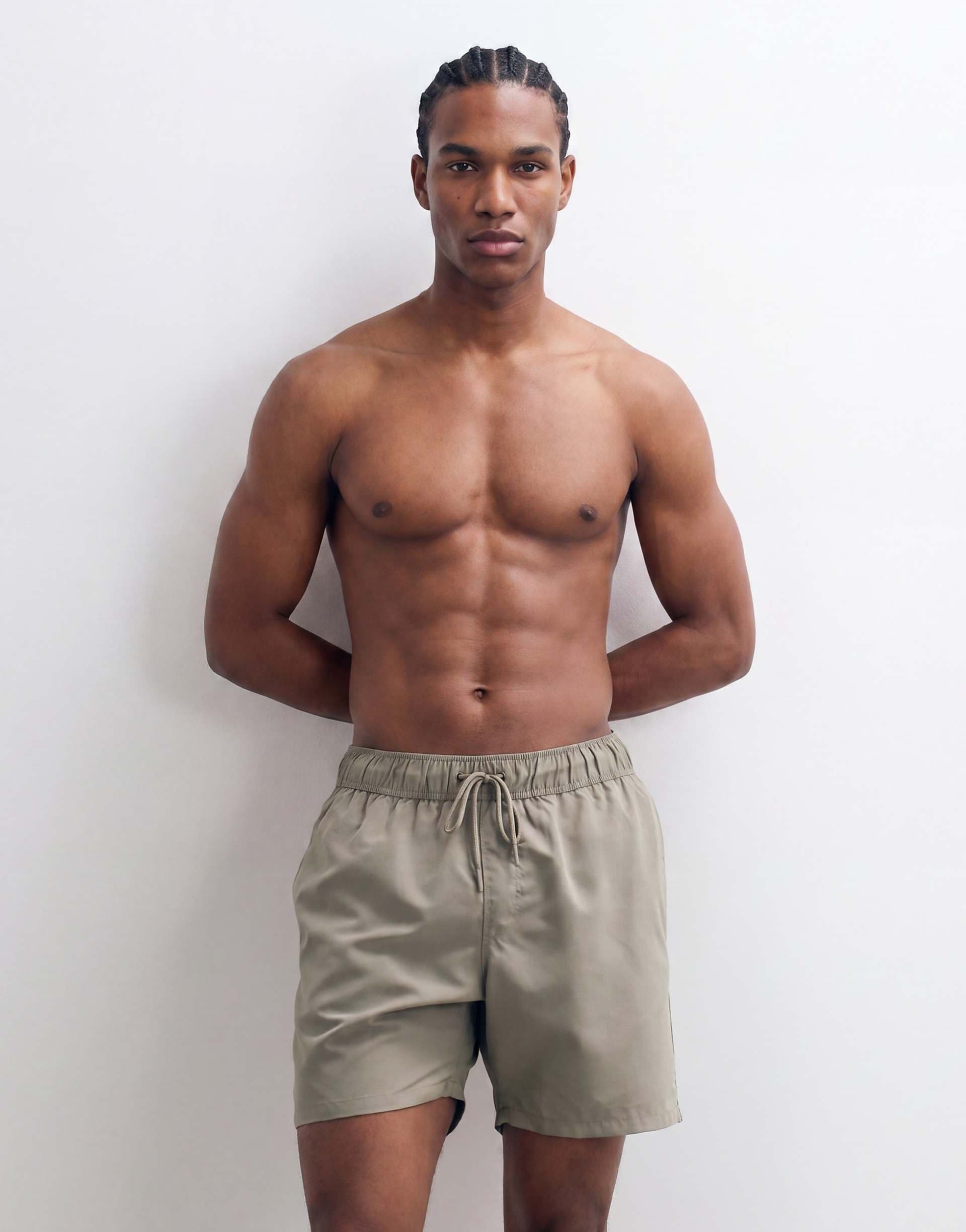 ASOS DESIGN swim shorts in mid length in khaki