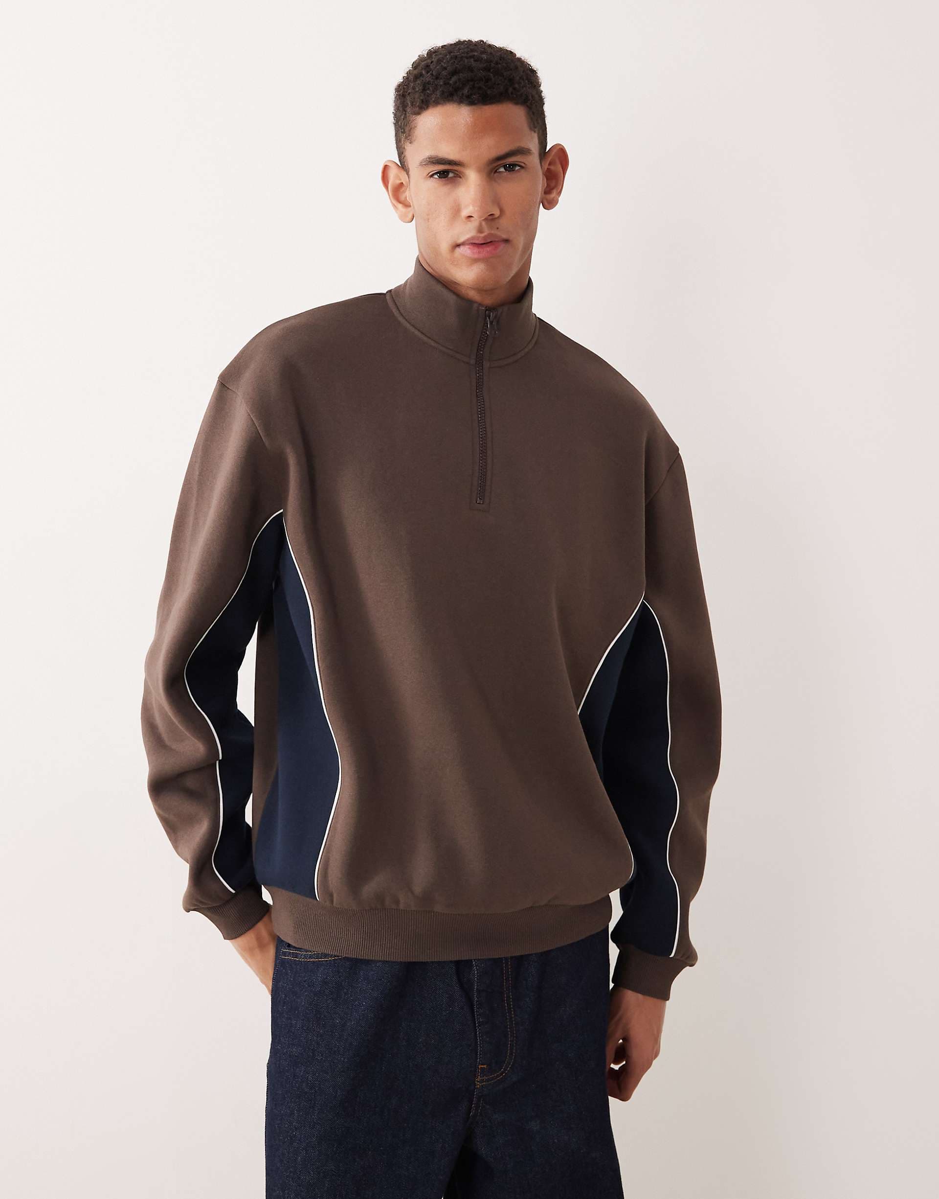 ASOS DESIGN relaxed half zip sweatshirt with cut and sew panels in brown