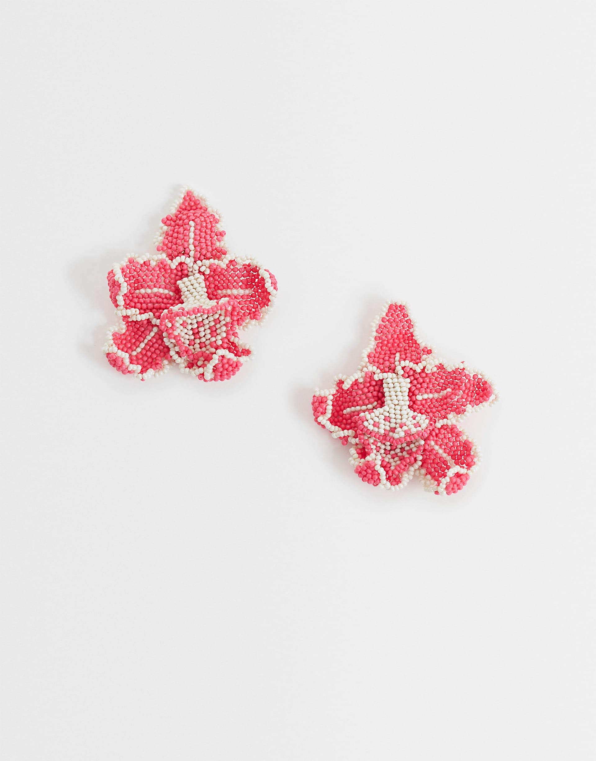ASOS DESIGN stud earrings with beaded floral orchids design in pink