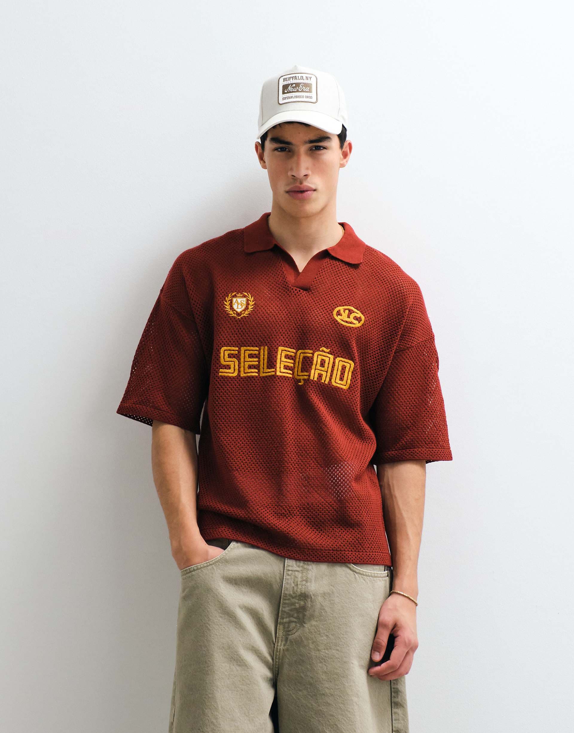 ASOS DESIGN relaxed knit soccer-style notch neck polo shirt with embroidery in red