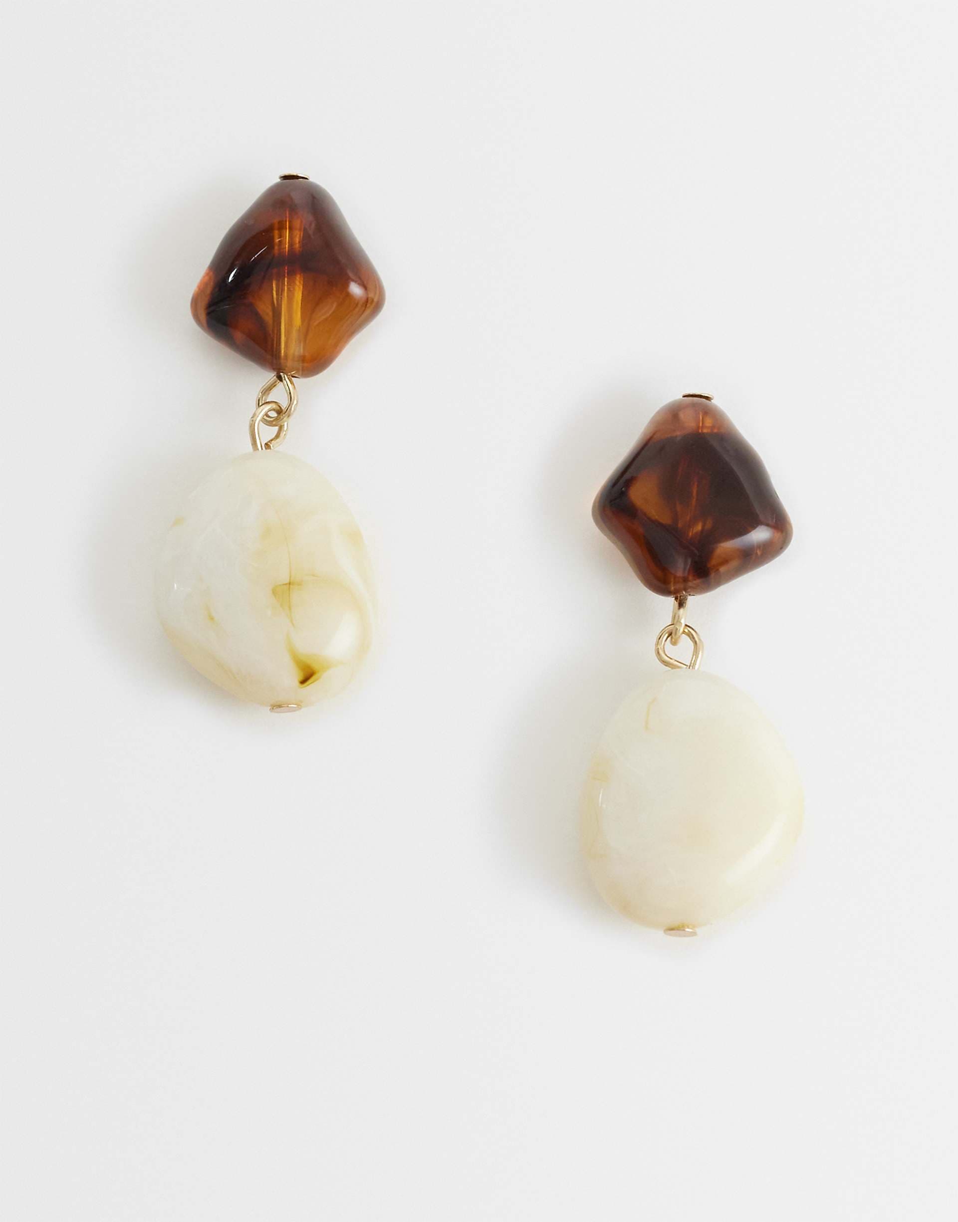 ASOS DESIGN pendant earrings in neutral resin