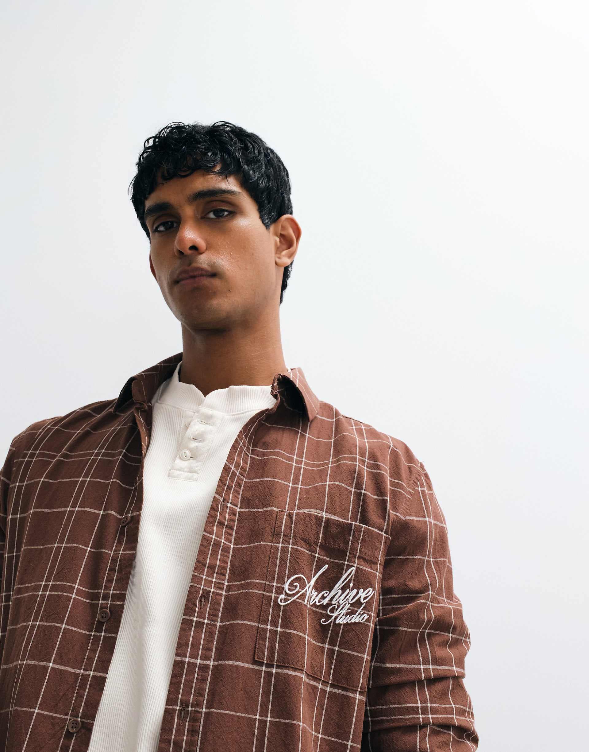 ASOS DESIGN regular fit plaid shirt with chest embroidery in brown