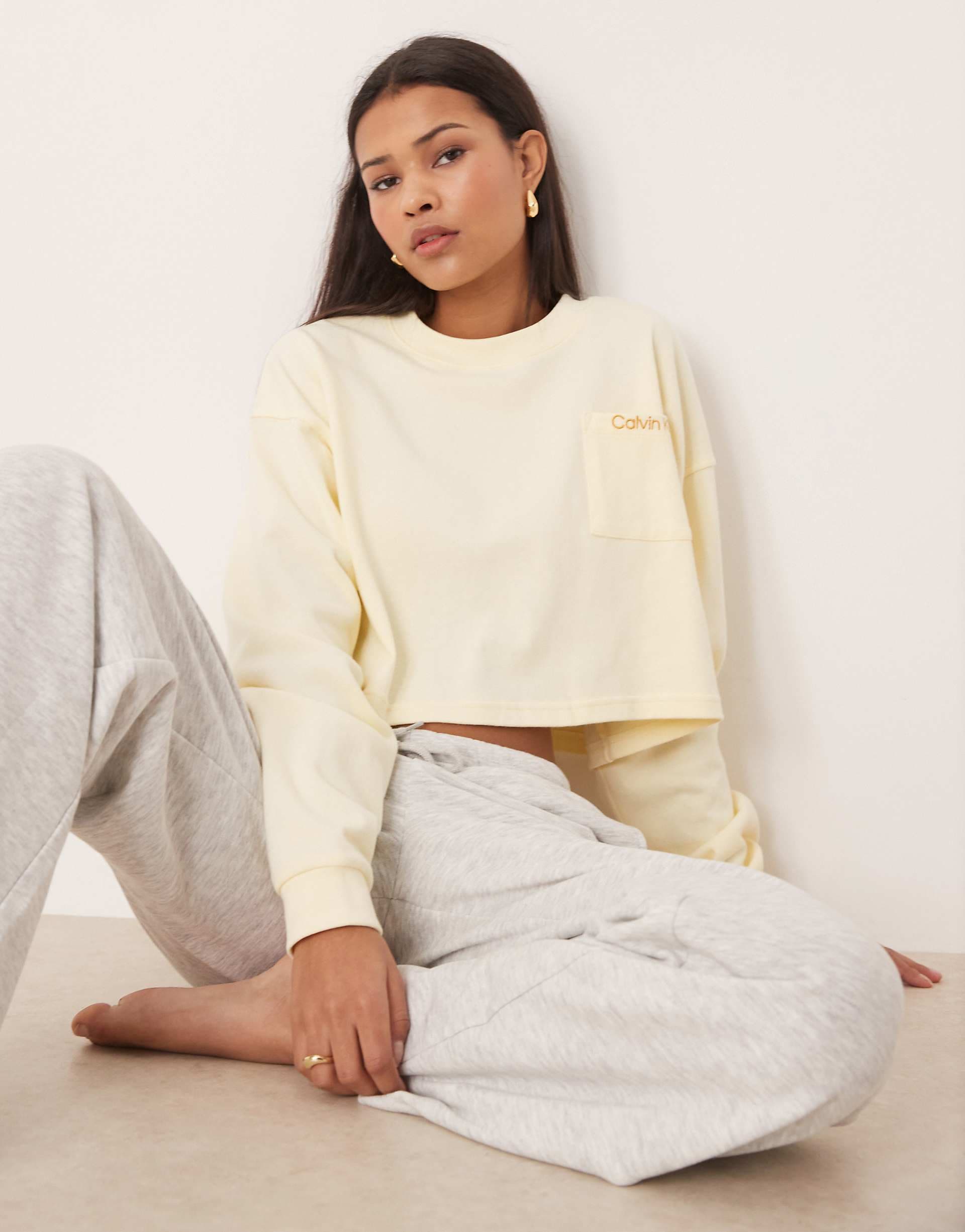 Calvin Klein cropped logo jersey sweatshirt in butter yellow
