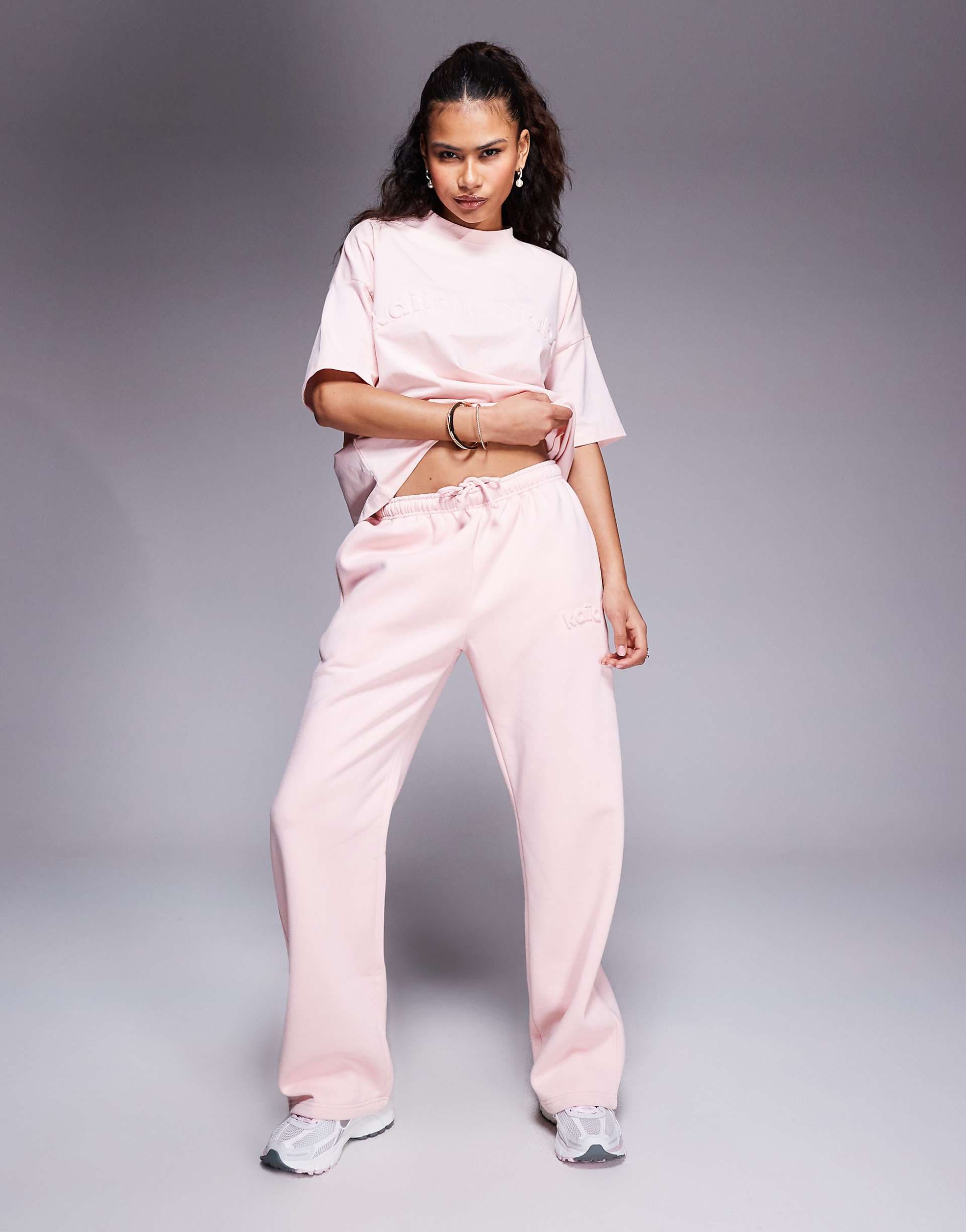 Kaiia embossed logo wide leg sweatpants in soft pink - part of a set
