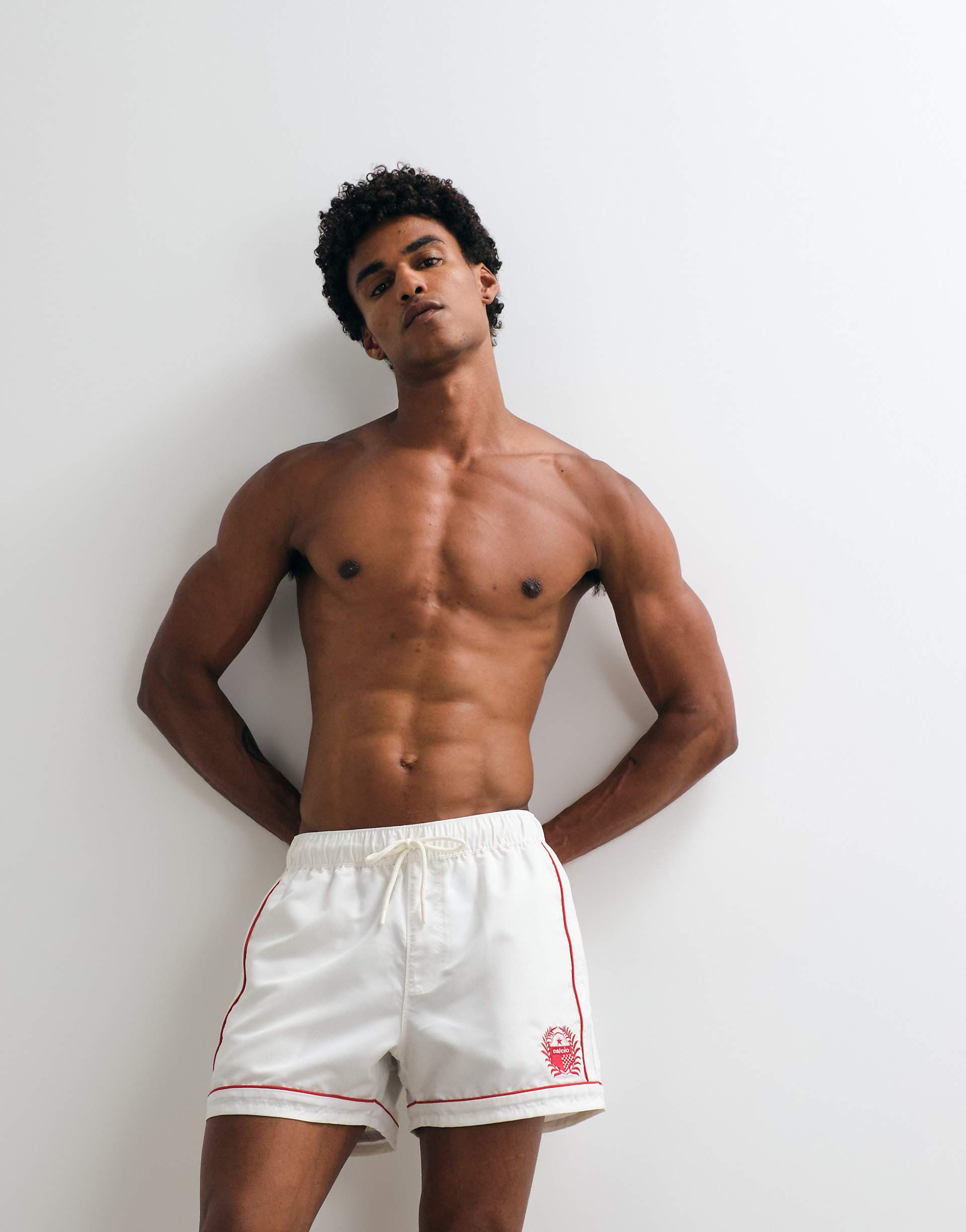 ASOS DESIGN short length swim shorts with piping and embroidery in white