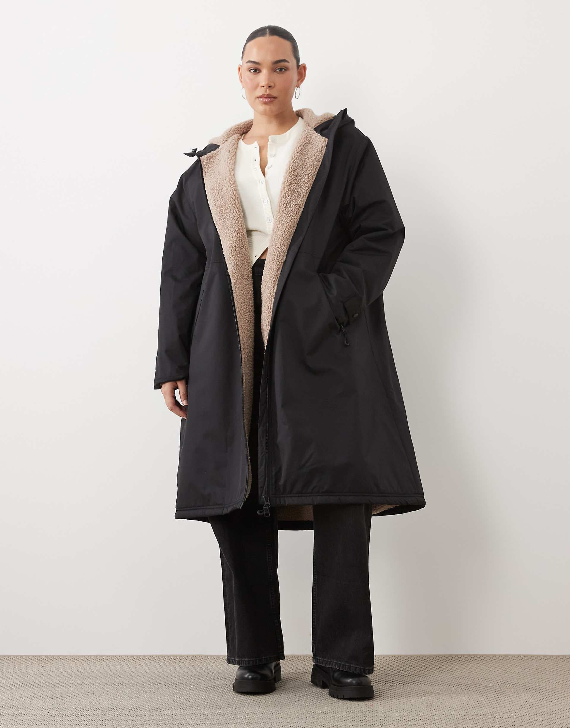 ASOS DESIGN Curve longline rain coat with borg liner in black