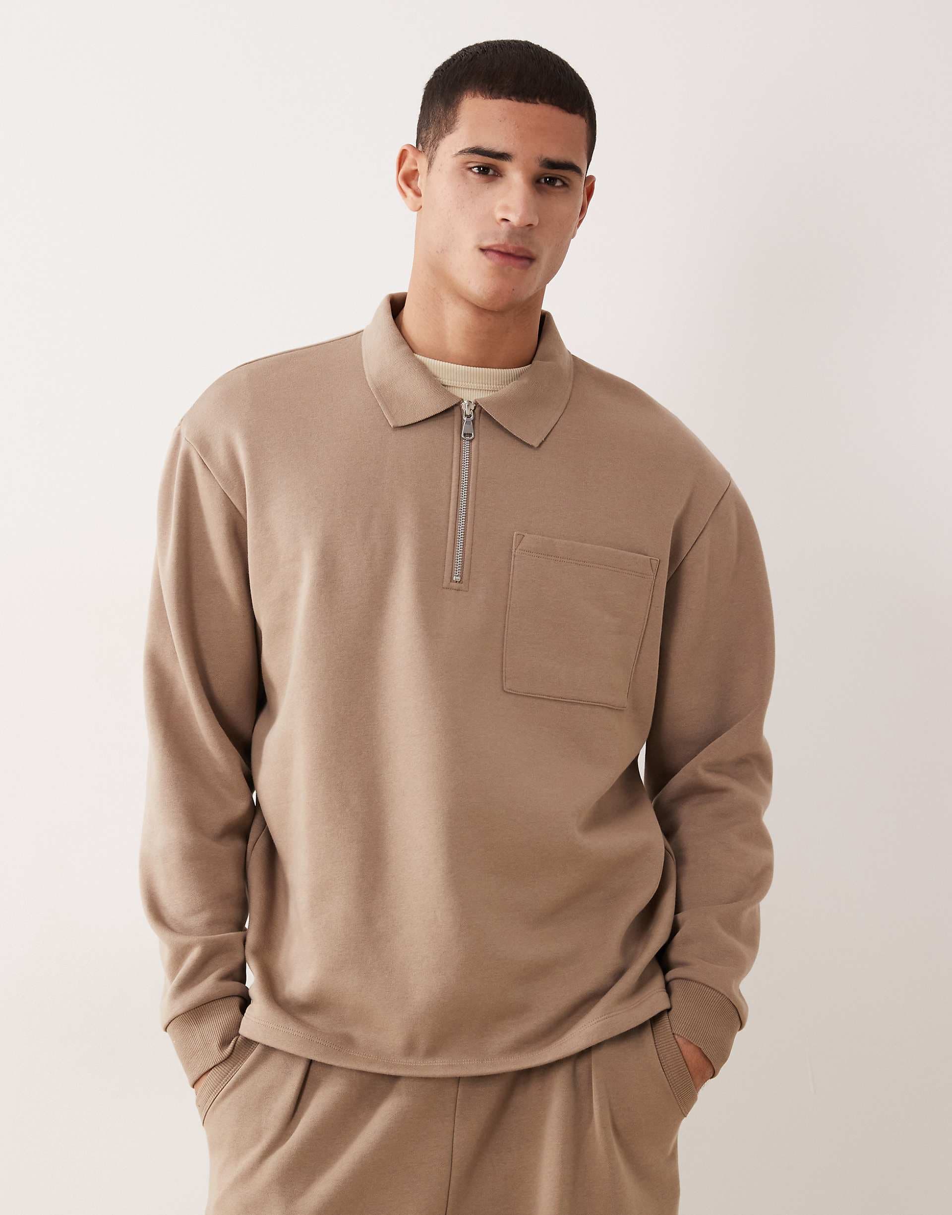 ASOS DESIGN oversized quarter zip sweatshirt with ribbed collar in beige