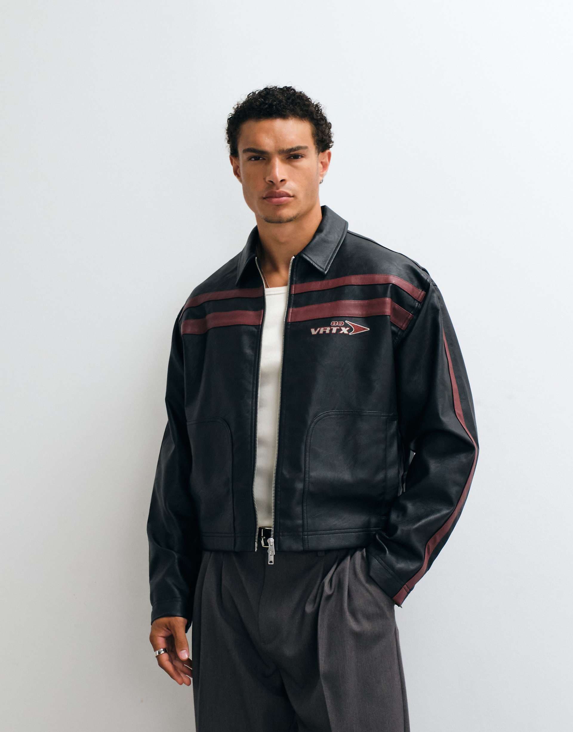 ASOS DESIGN faux leather boxy oversized motocross jacket in black with burgundy stripes
