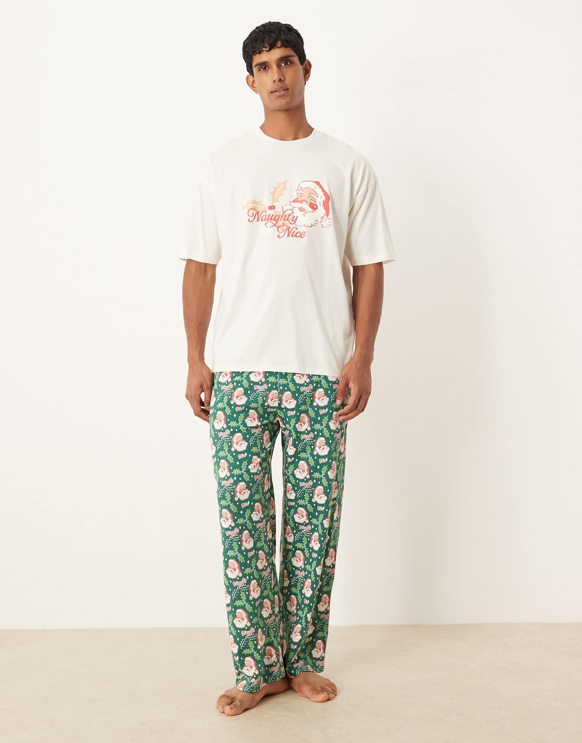 ASOS DESIGN Christmas pajama set with retro Santa graphics in blue