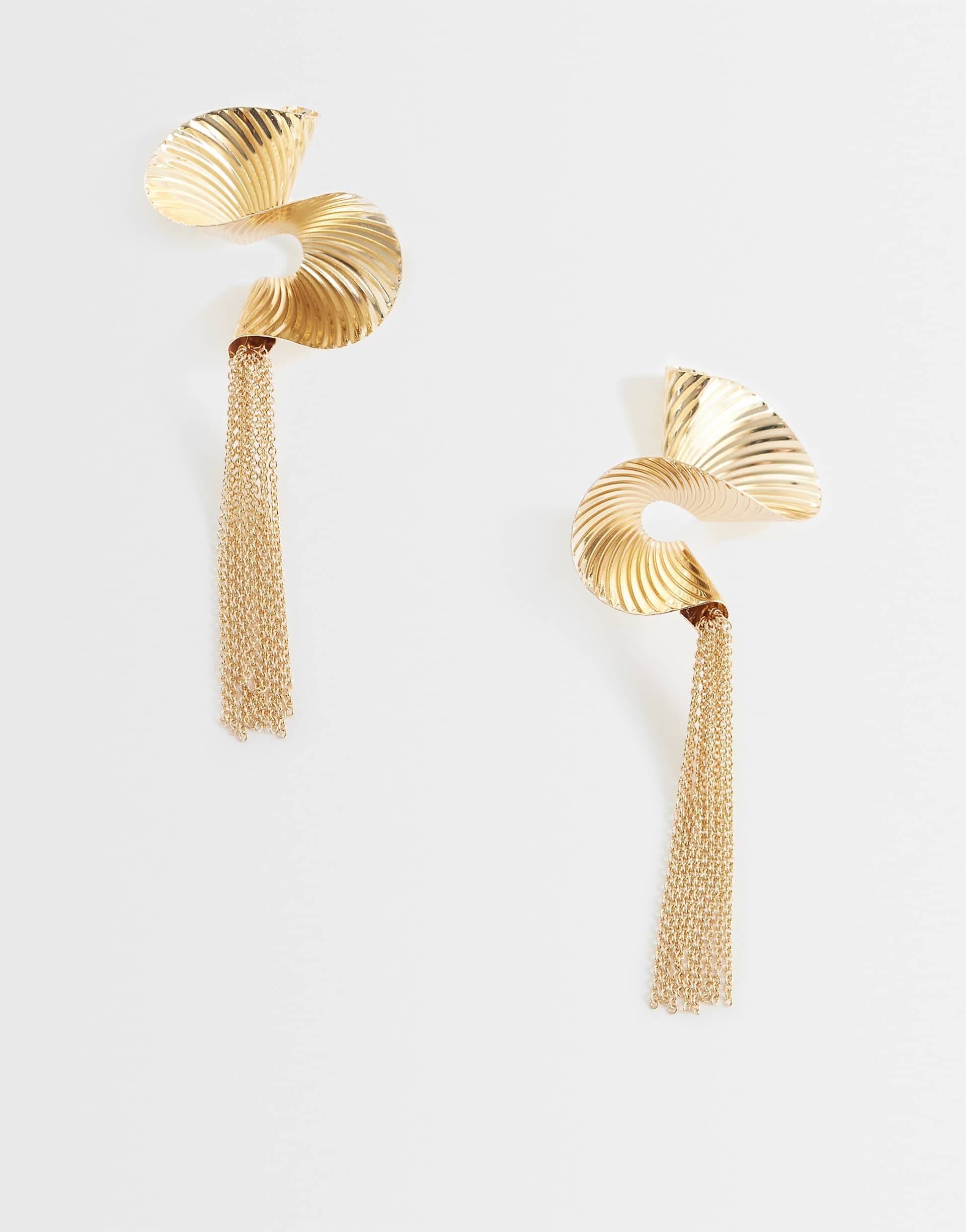 ASOS DESIGN large twisted earrings with chain tassels in gold tone