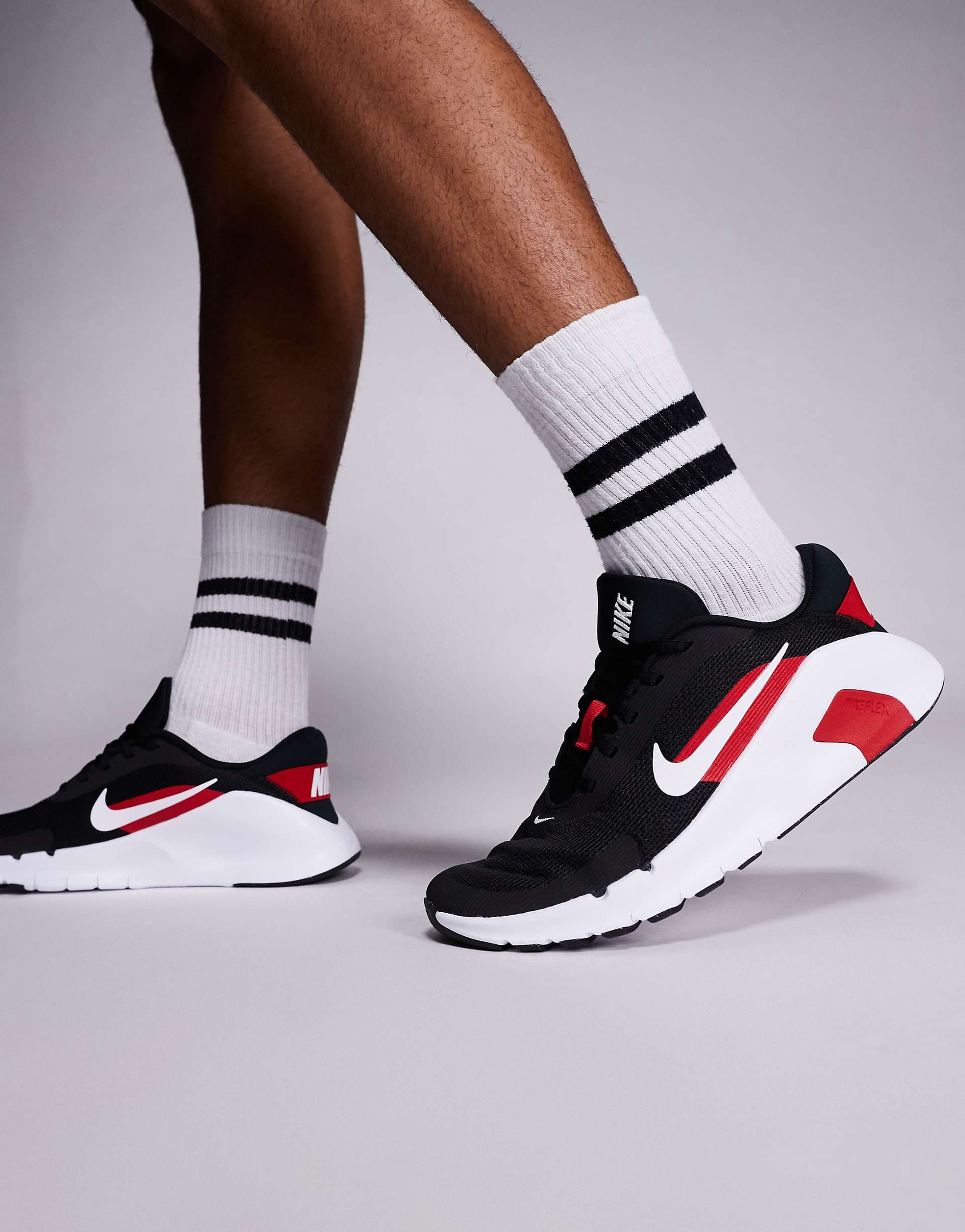 Nike Training Flex sneakers in black and red