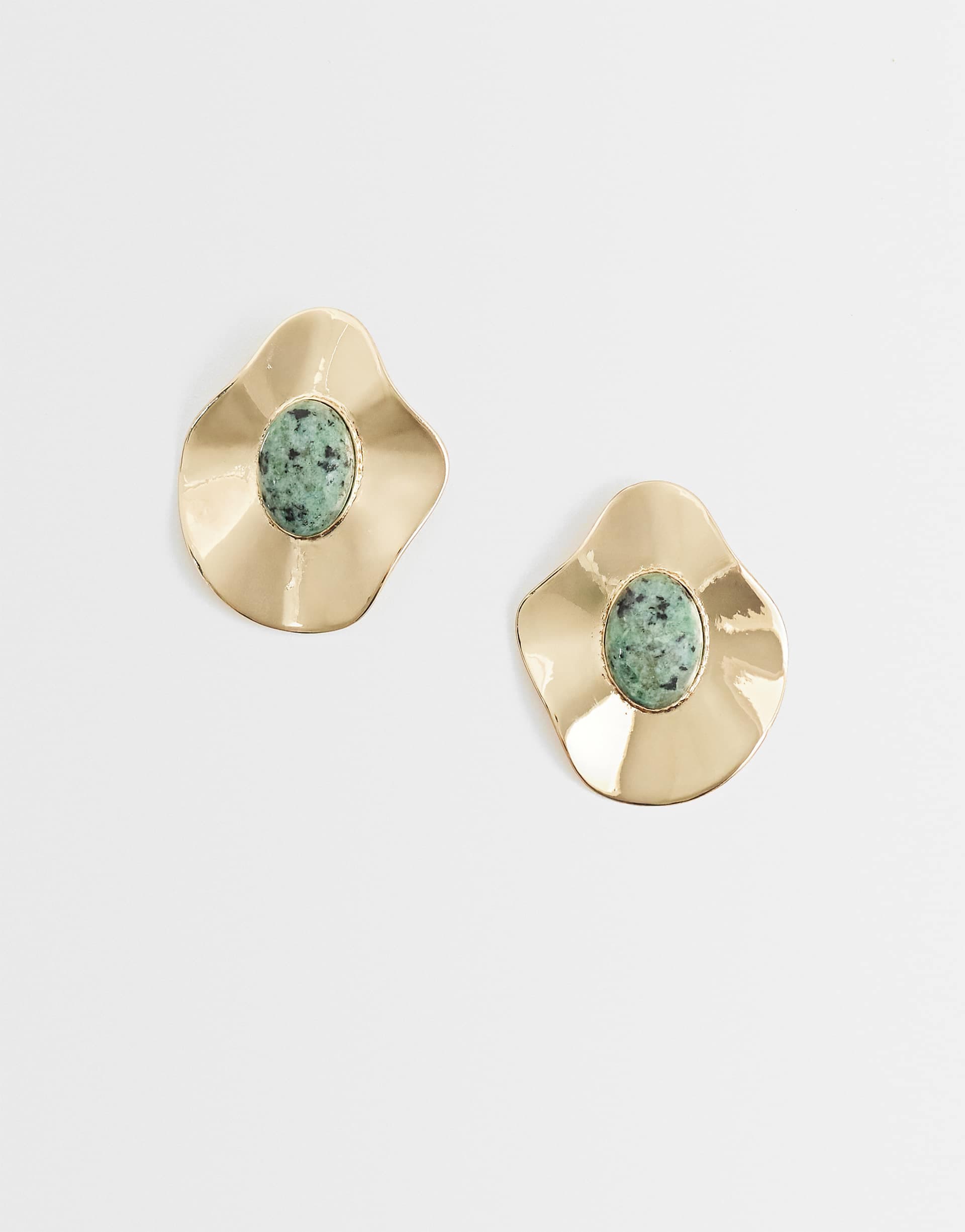 ASOS DESIGN stud earrings with molten pendant and green stone-setting in gold tone