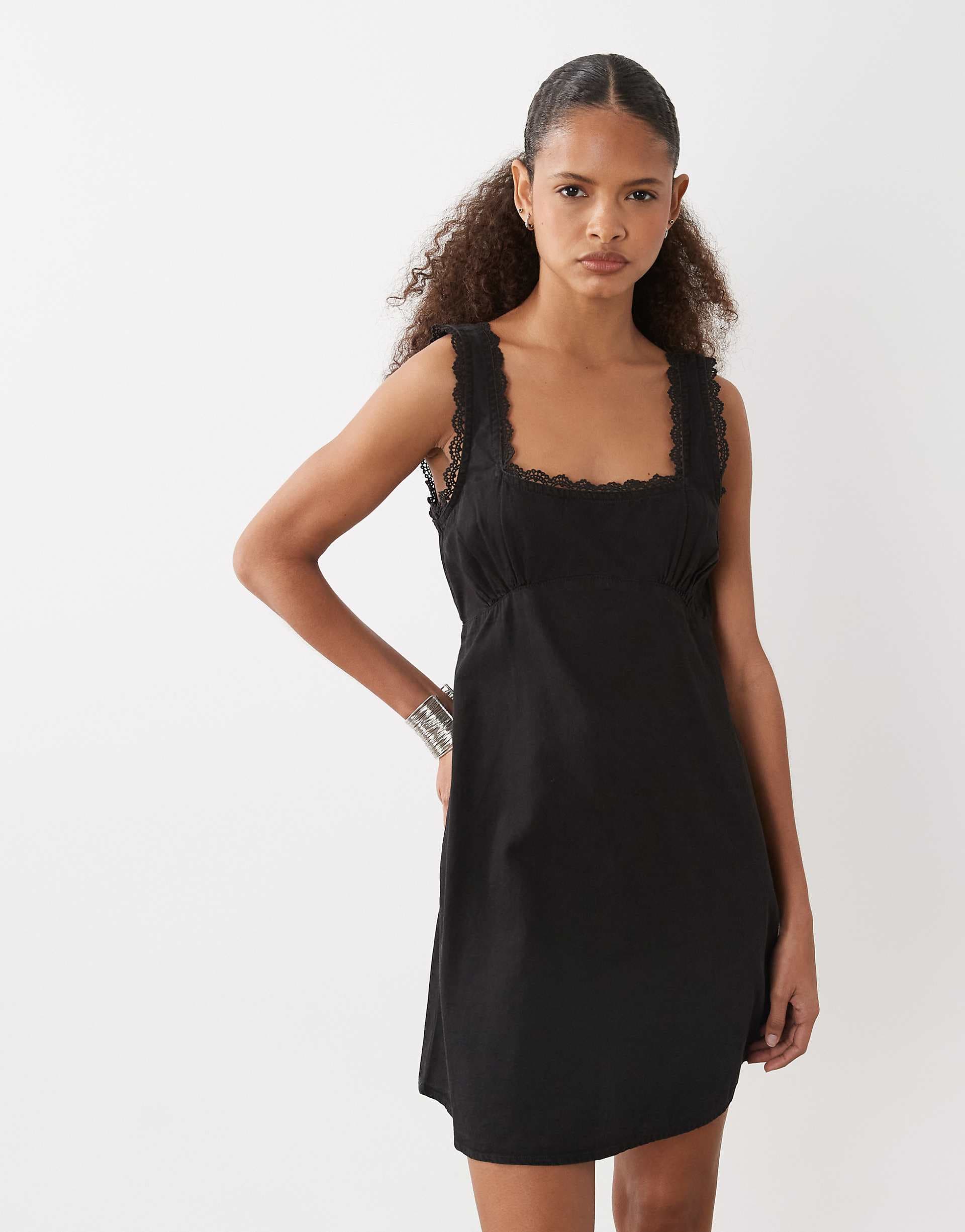 ASOS DESIGN denim mini dress with crochet trim detail in black