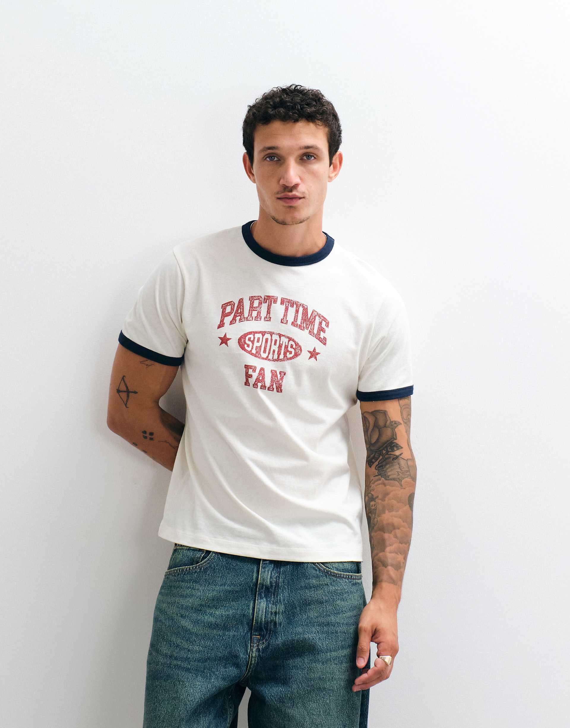 ASOS DESIGN boxy regular ringer T-shirt with sports slogan graphic in cream