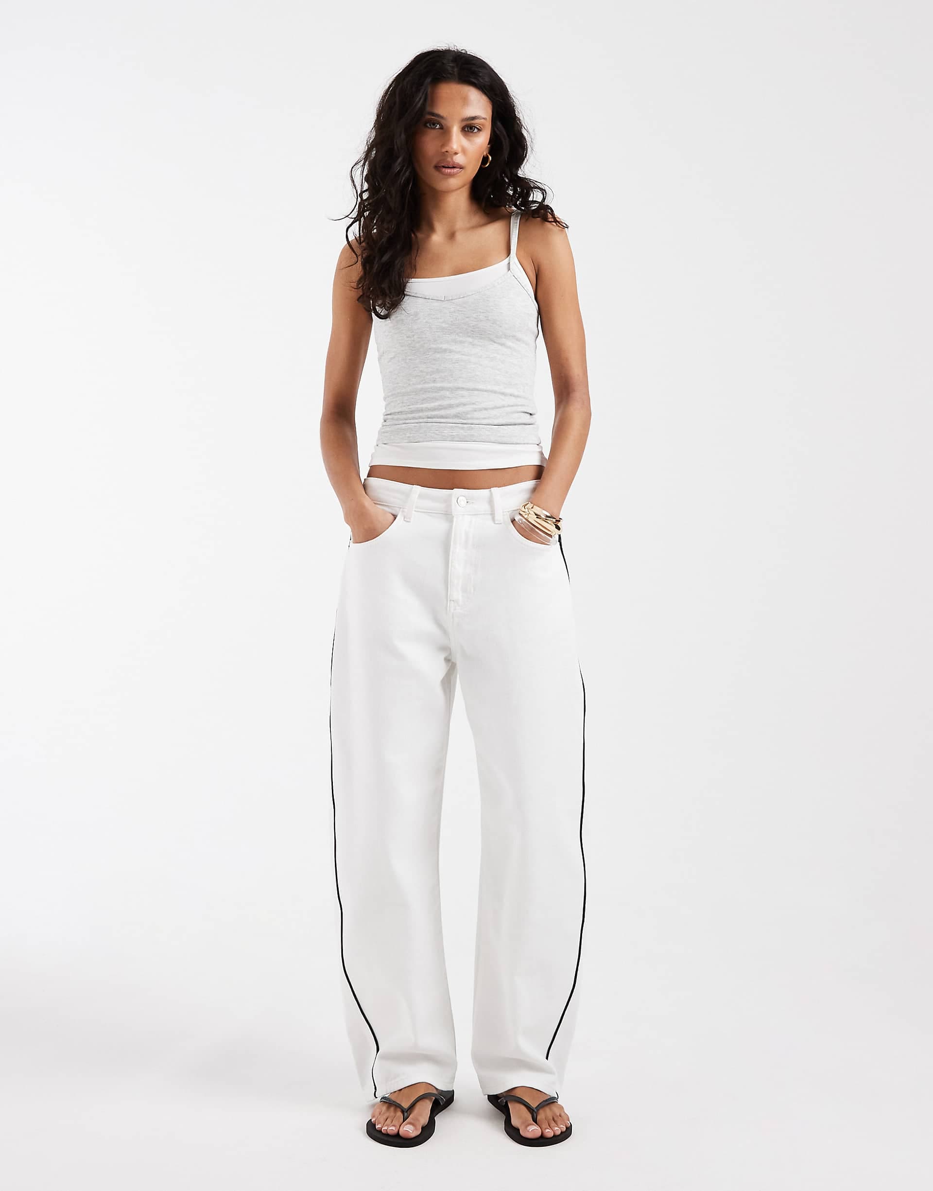 ASOS DESIGN barrel leg jeans in white with contrast black side piping