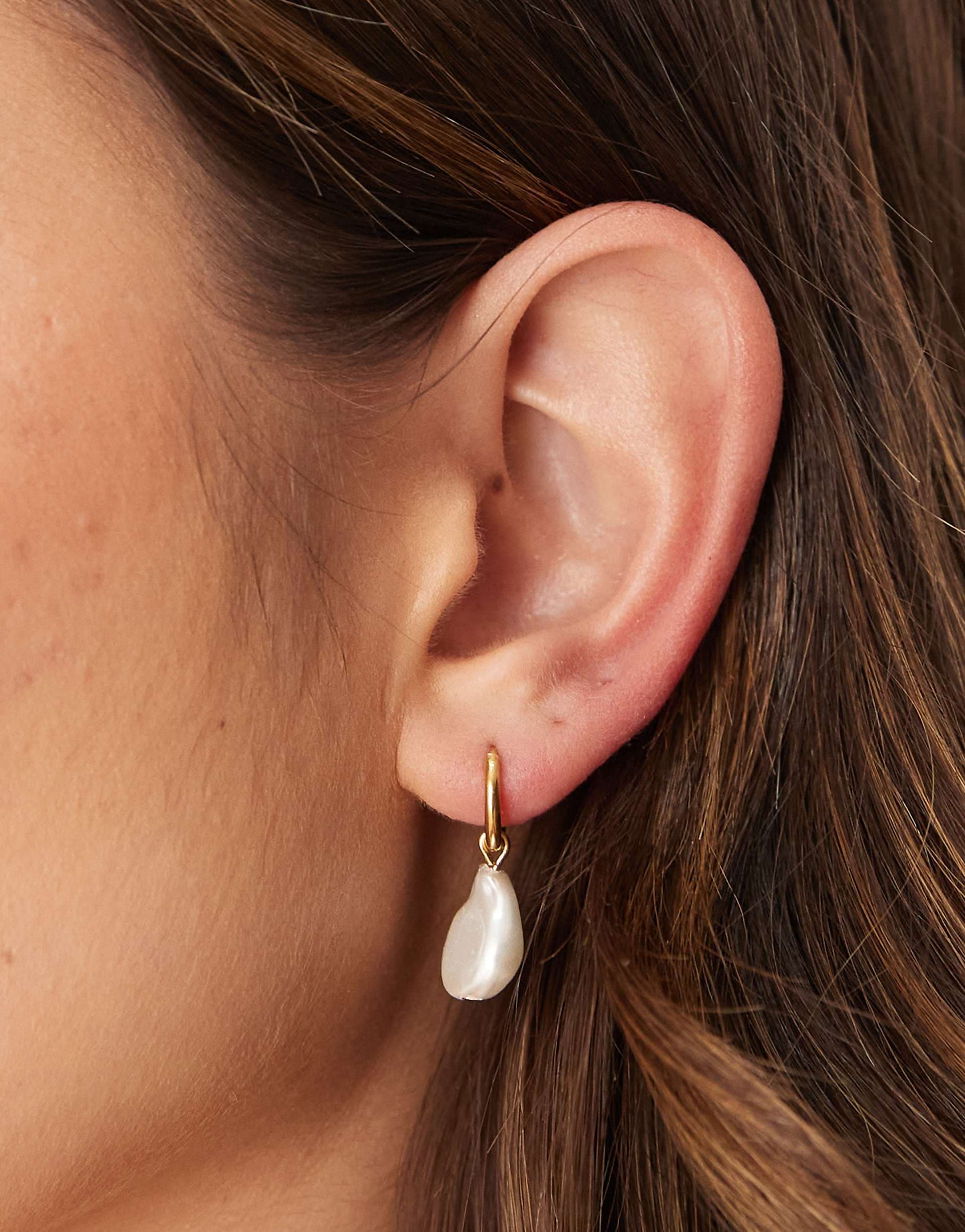 Lost Souls small huggie hoop earrings with pearl charm in 18ct gold plated stainless steel