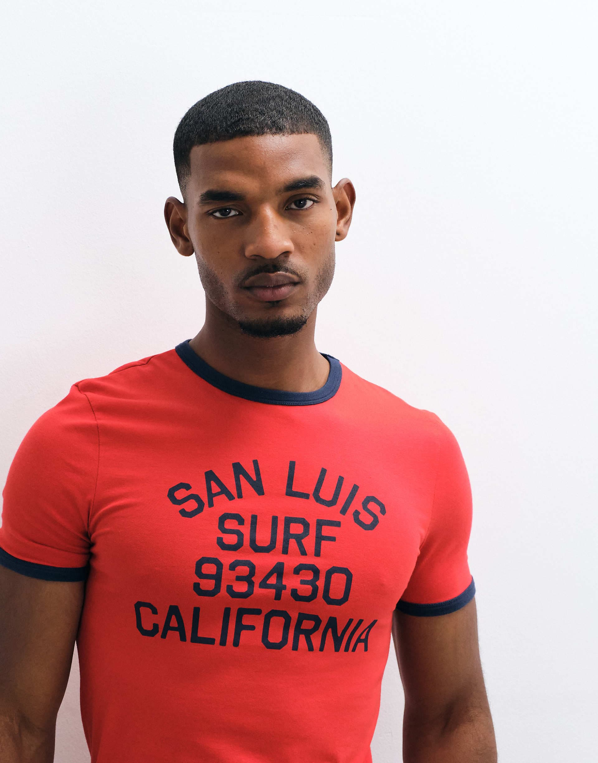 ASOS DESIGN muscle fit ringer T-shirt with surf print in red