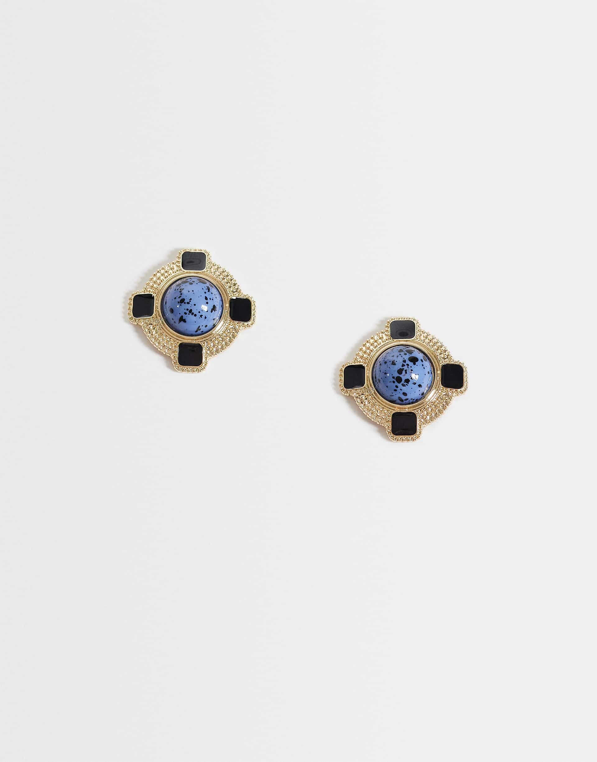 ASOS DESIGN stud earrings with vintage-style design and blue stone setting in gold tone