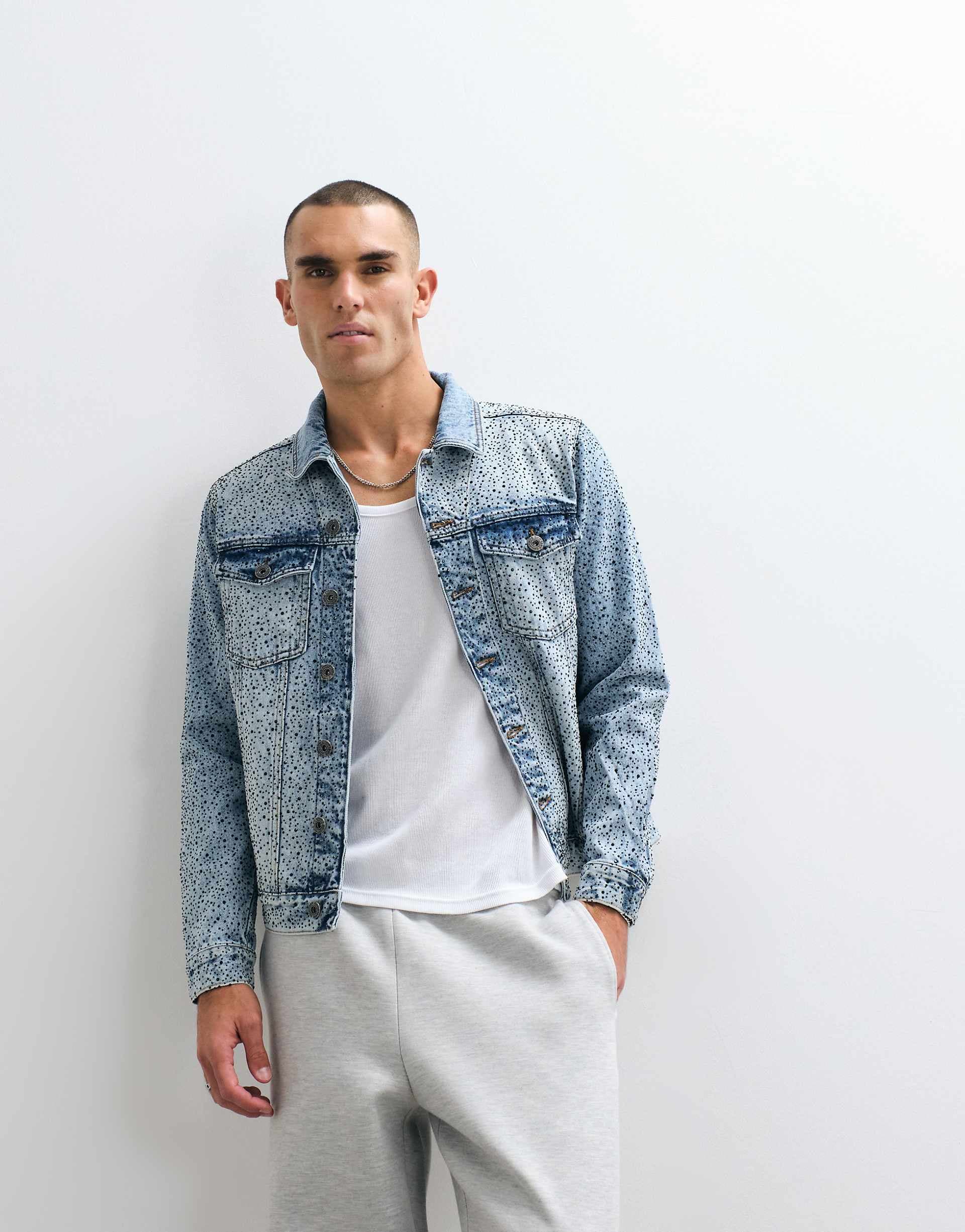 Courtside distressed denim jacket with rhinestone embellishments in light wash blue