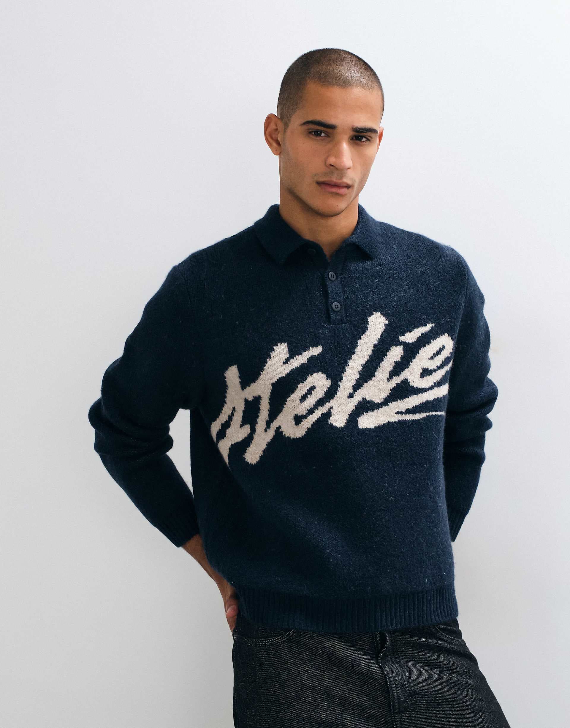 ASOS DESIGN oversized knit polo with atelier graphic in black