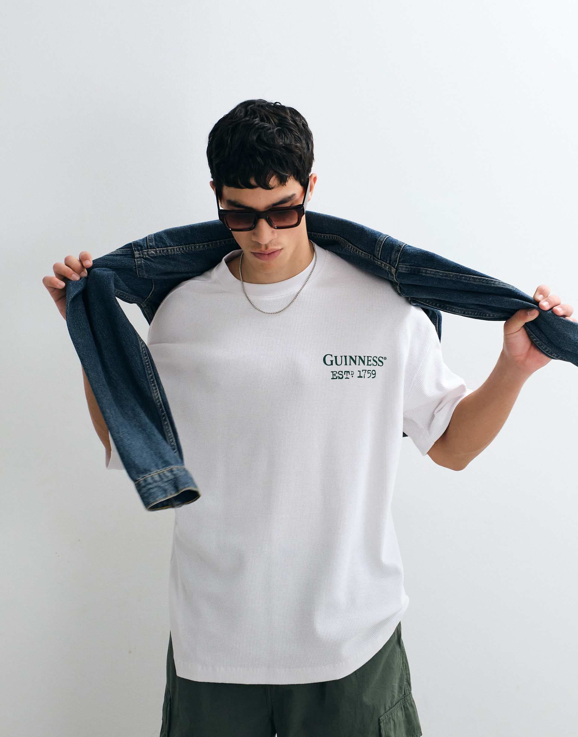 ASOS DESIGN oversized t-shirt with Guinness print in black