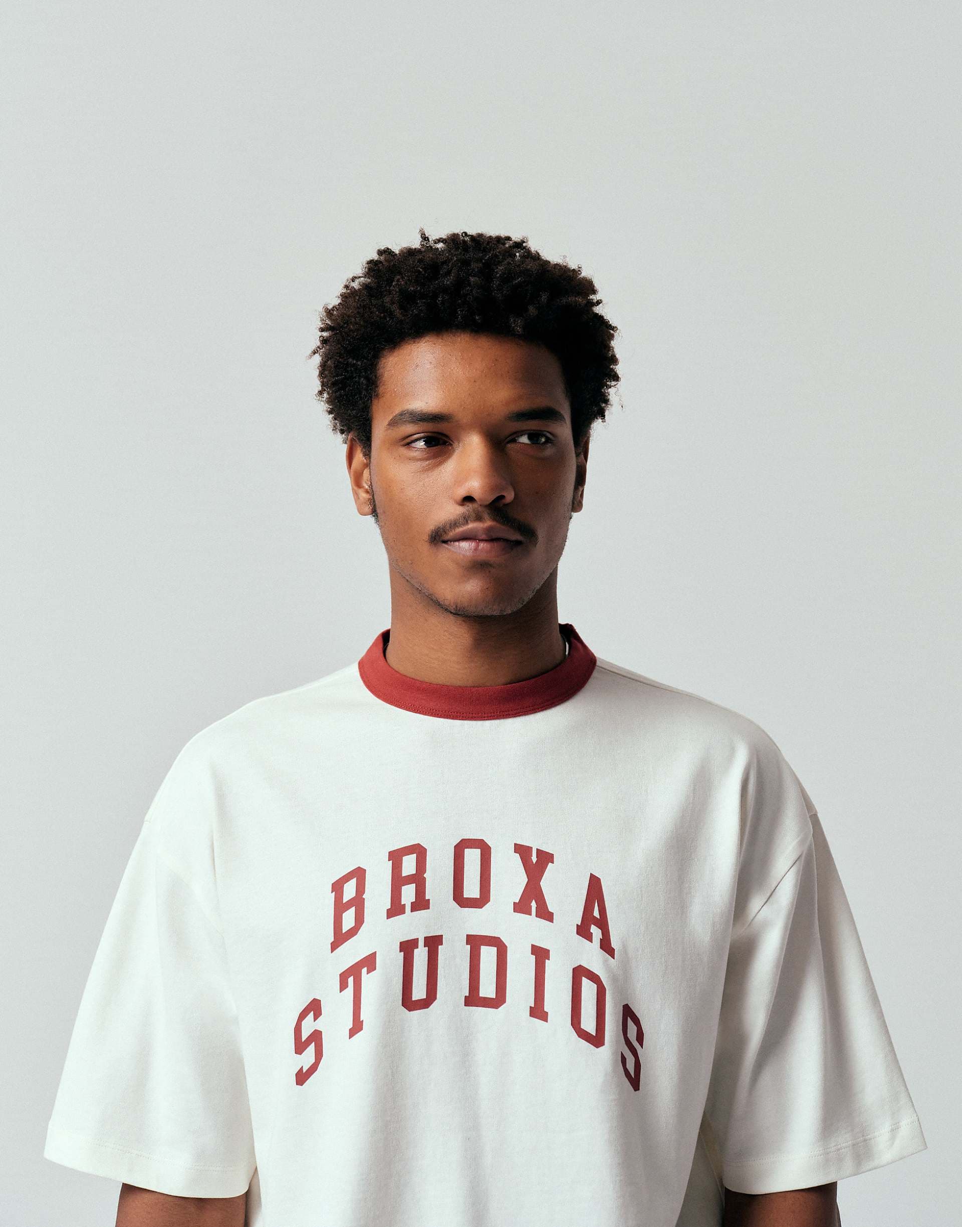 ASOS DESIGN heavyweight oversized T-shirt with text graphic in off white