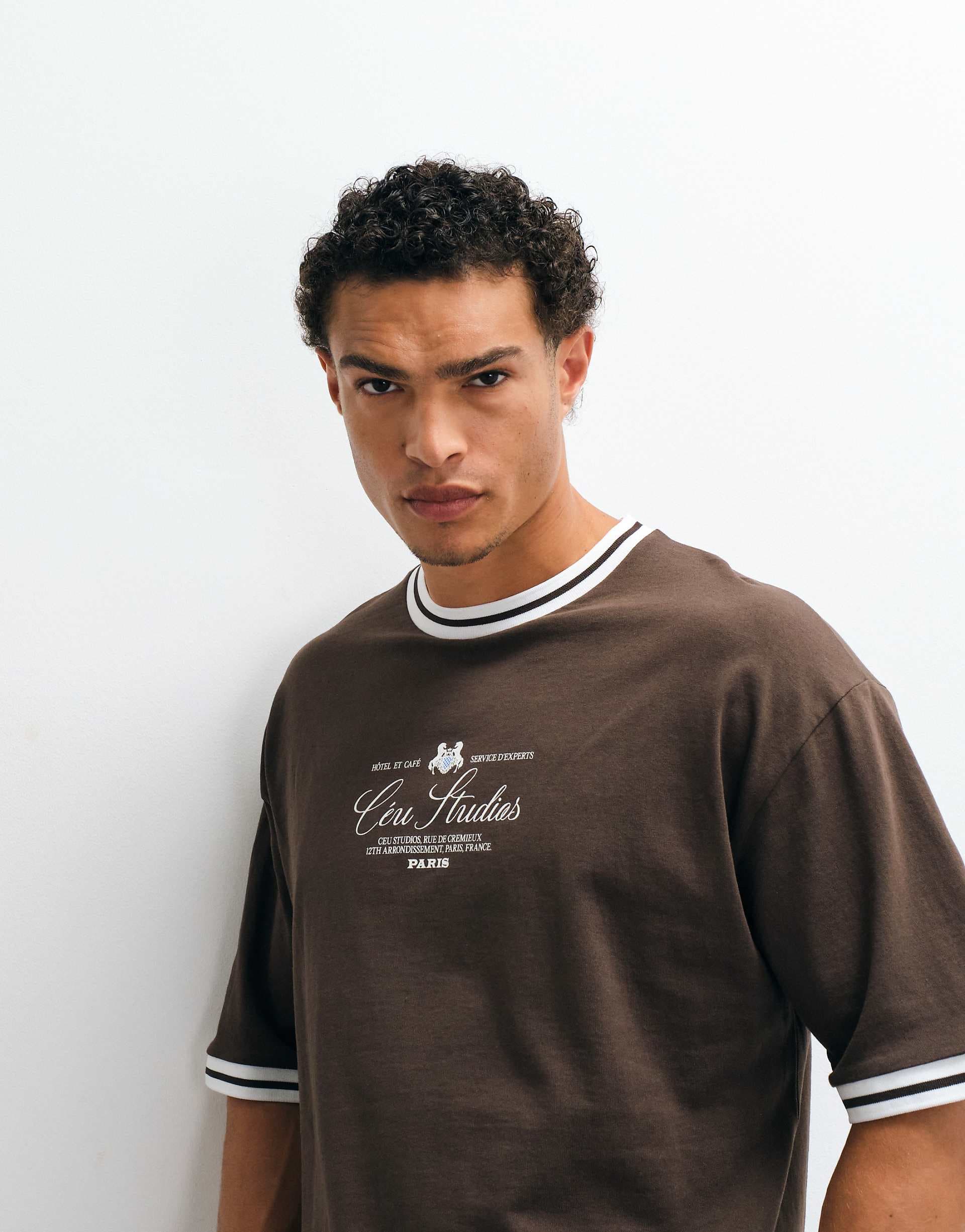 ASOS DESIGN boxy oversized t-shirt with text graphic in brown