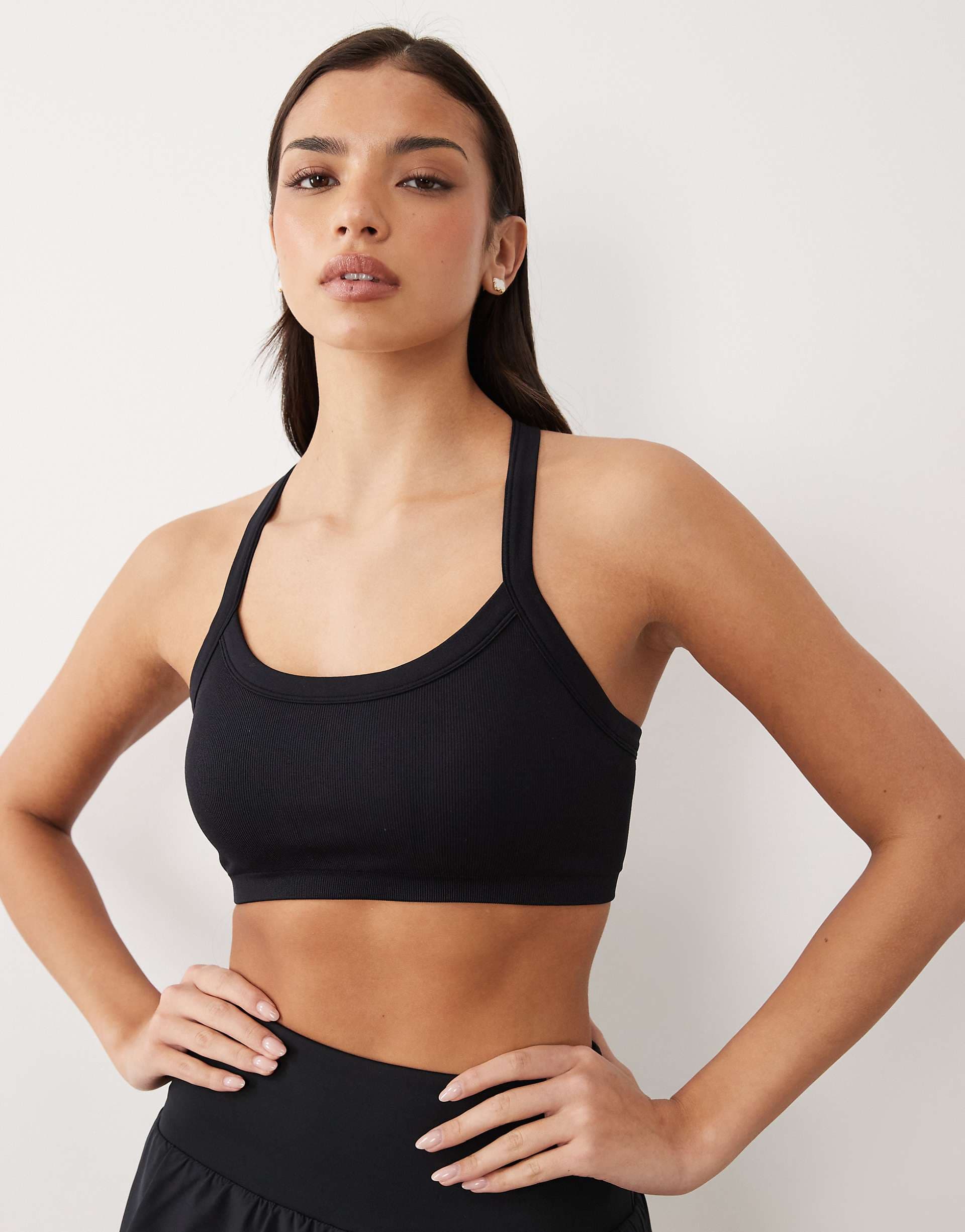 4505 seamless baby rib knit medium support sports bra with adjustable straps in black