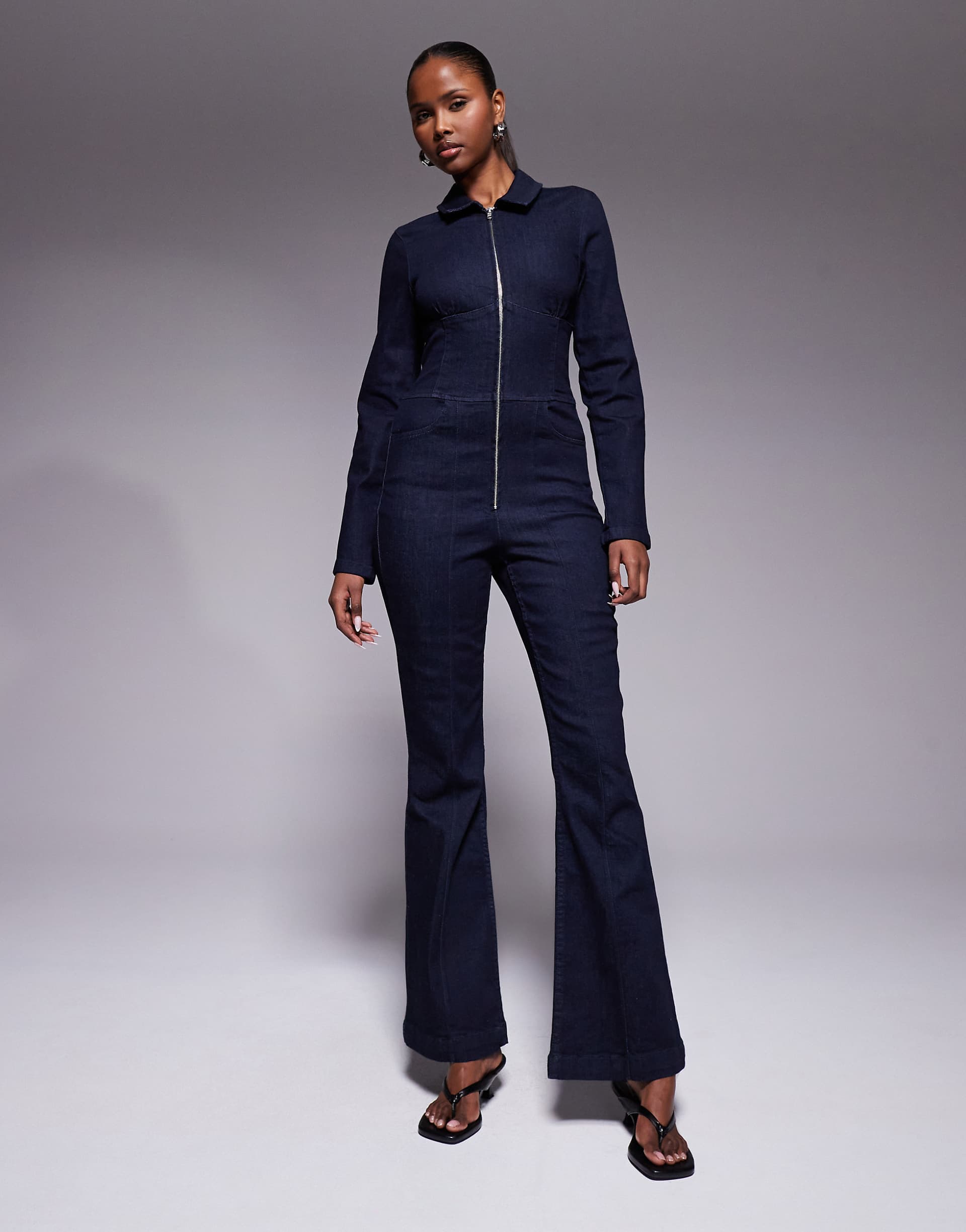ASOS DESIGN stretch denim jumpsuit with corset waist in inky wash