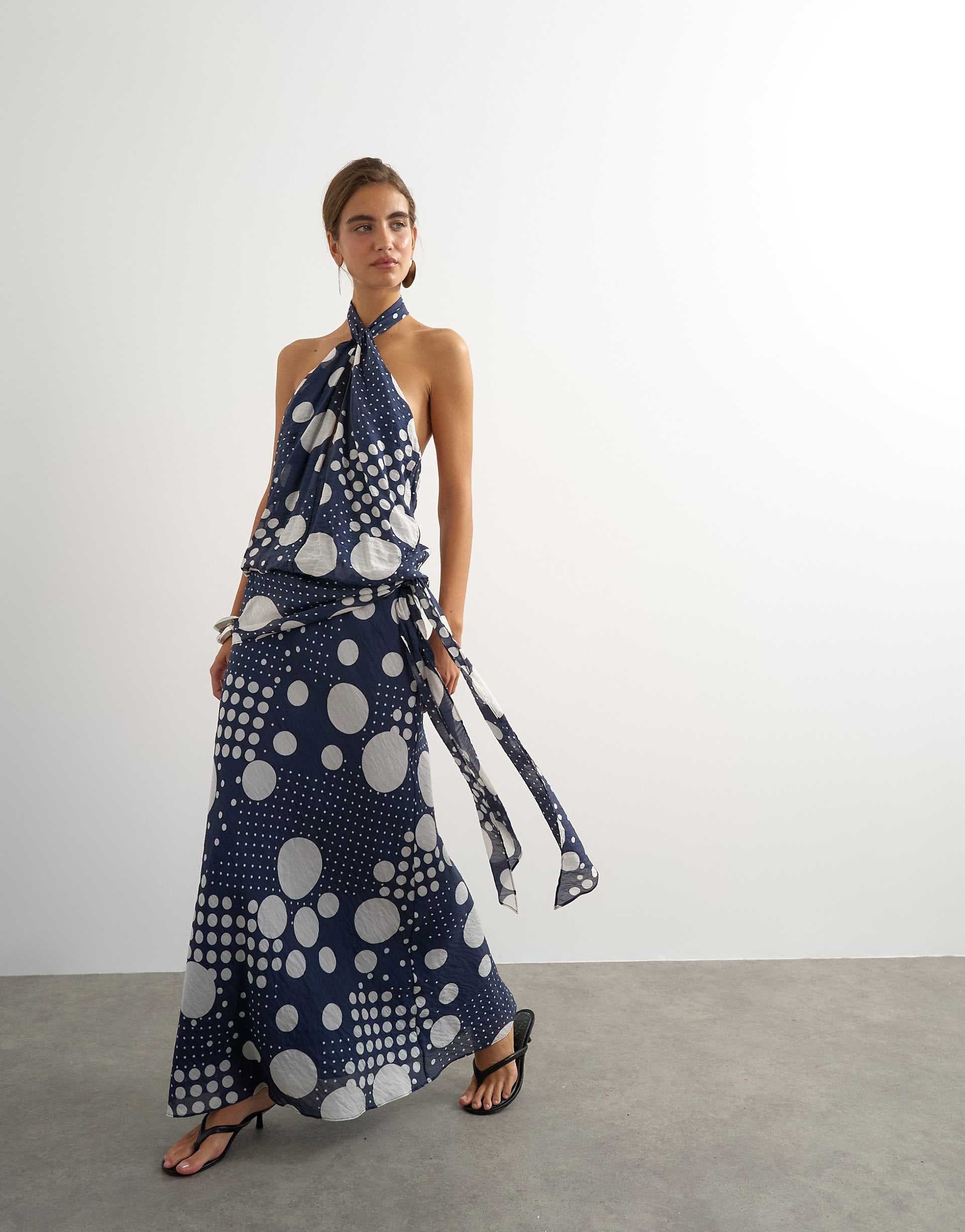 Topshop halterneck dropped waist tie detail maxi dress in navy mixed dot