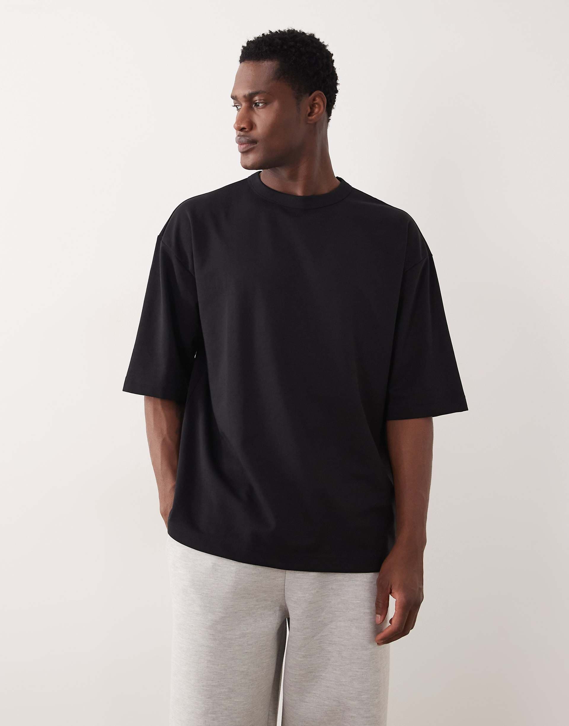 ASOS DESIGN breatheMAX™ heavyweight oversized half sleeve T-shirt in black cotton blend