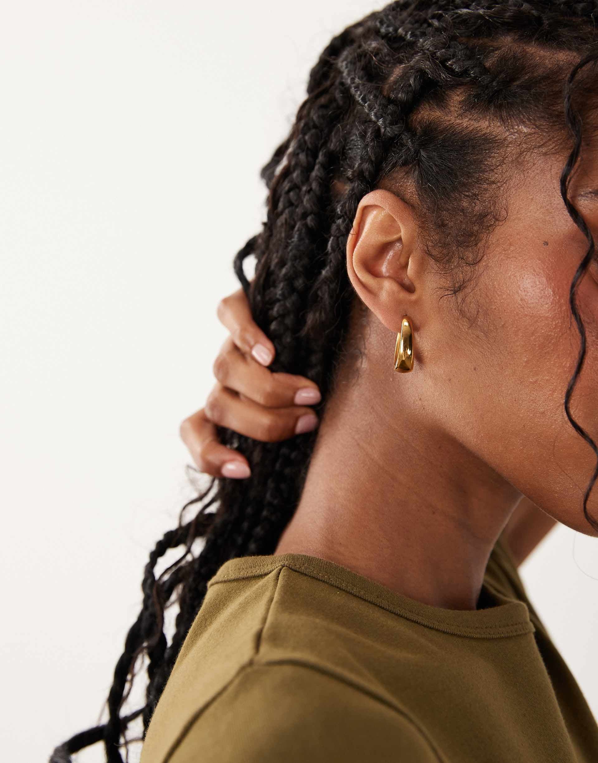 ASOS DESIGN waterproof stainless steel hoop earrings with oval design in gold tone