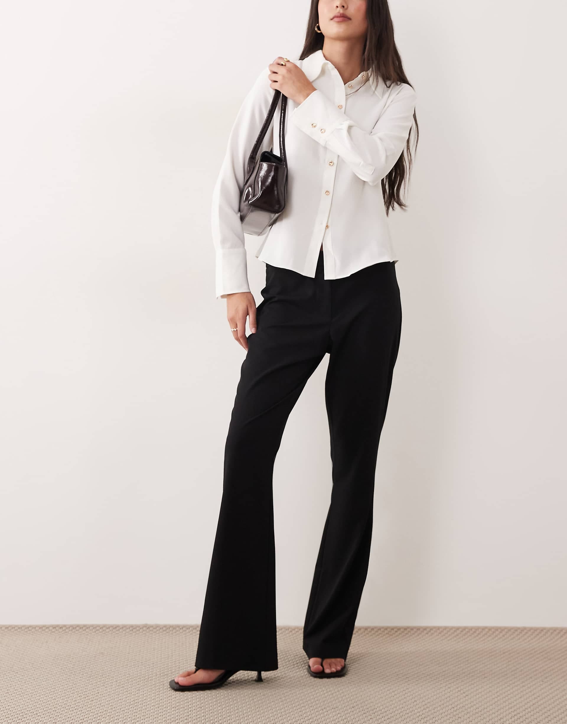 ASOS DESIGN mid rise tailored bootcut flared pants in black