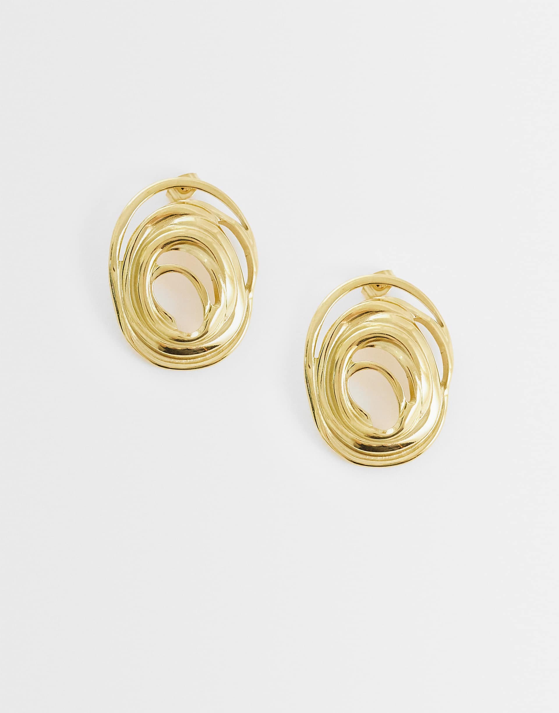Lost Souls spiral earrings in 18kt gold plated stainless steel